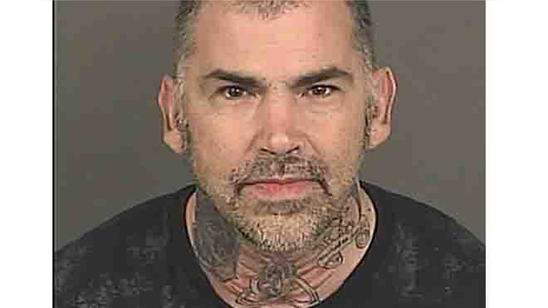 Jan. 29, 2014: In this file photo provided by the Denver District Attorney's Office suspect Michael Todd Abromovich is pictured.