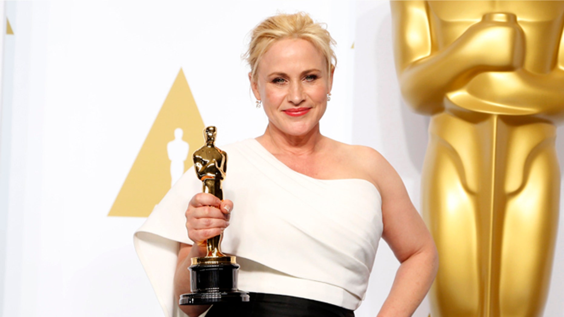 Feb 22, 2015. Patricia Arquette, best supporting actress winner for her role in "Boyhood" poses with her award during the 87th Academy Awards.