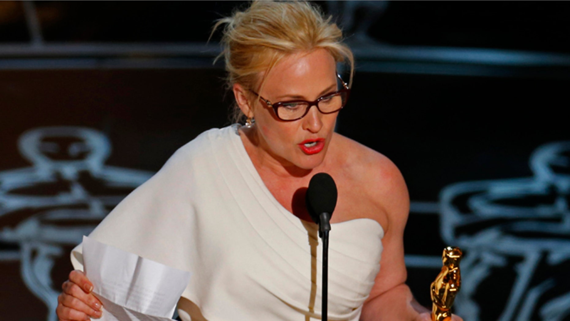 Patricia Arquette speaks after winning the Oscar for Best Supporting Actress for her role in "Boyhood" at the 87th Academy Awards in Hollywood, California February 22, 2015. REUTERS/Mike Blake (UNITED STATES TAGS:ENTERTAINMENT) (OSCARS-SHOW) - RTR4QOOK