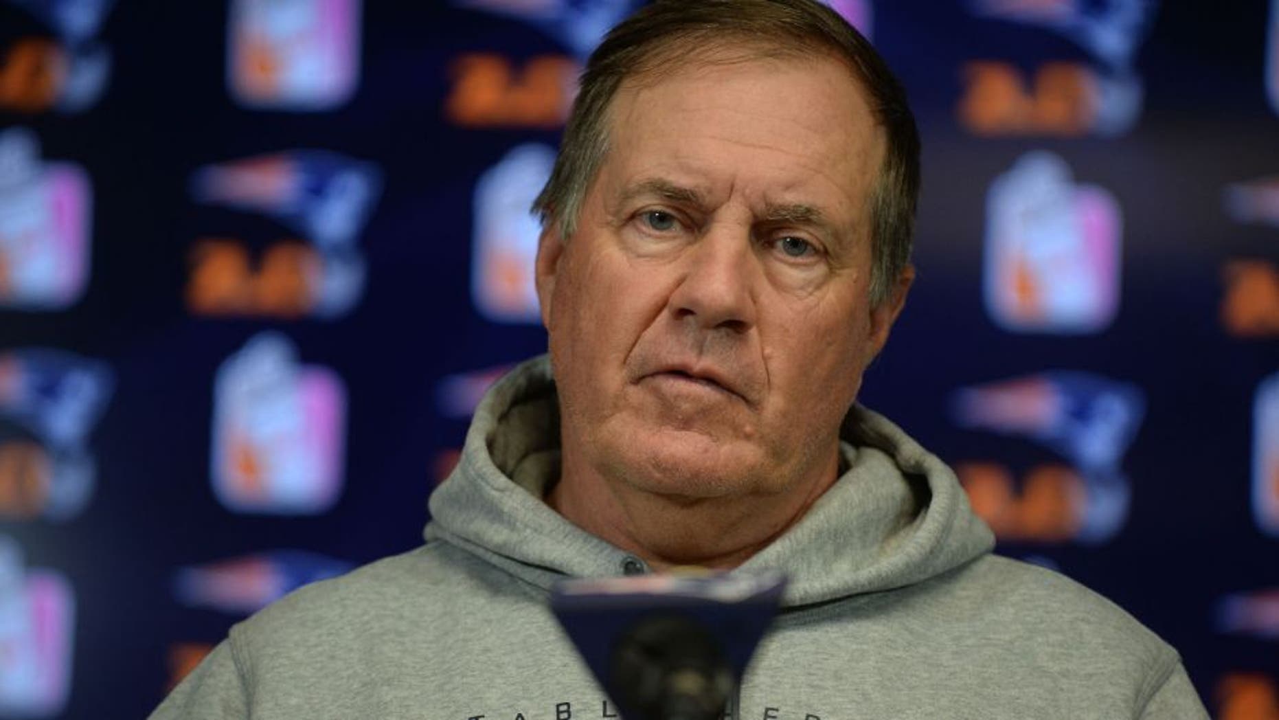 FOXBOROUGH, MA - JULY 29: New England Patriots head coach Bill Belichick speaks at a press conference at Gillette Stadium July 29, 2015 in Foxborough, Massachusetts. Belichick was asked about NFL Commissioner Roger Goodell's decision to uphold a four game suspension for quarterback Tom Brady for his role in using underinflated balls in the AFC Championship game in 2014. (Photo by Darren McCollester/Getty Images)