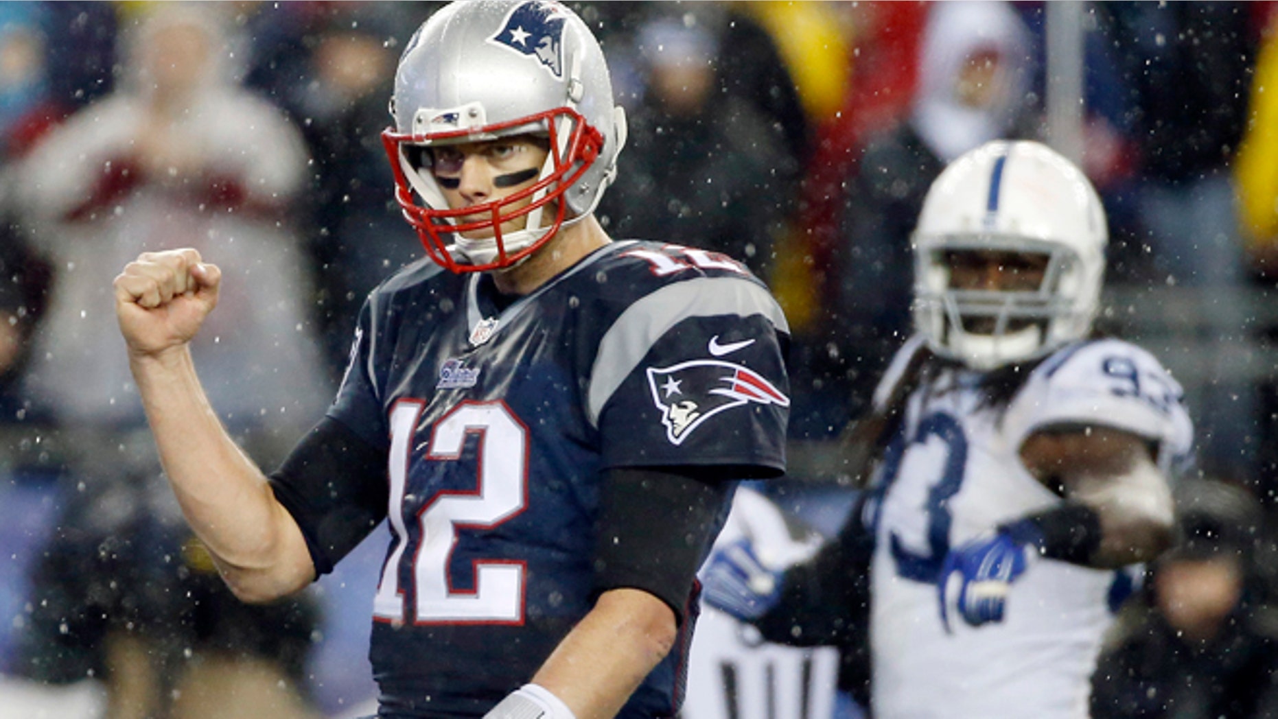 Jan. 18, 2015: New England Patriots quarterback Tom Brady (12) celebrates LeGarrette Blount's touchdown during the second half of the NFL football AFC Championship game against the Indianapolis Colts.