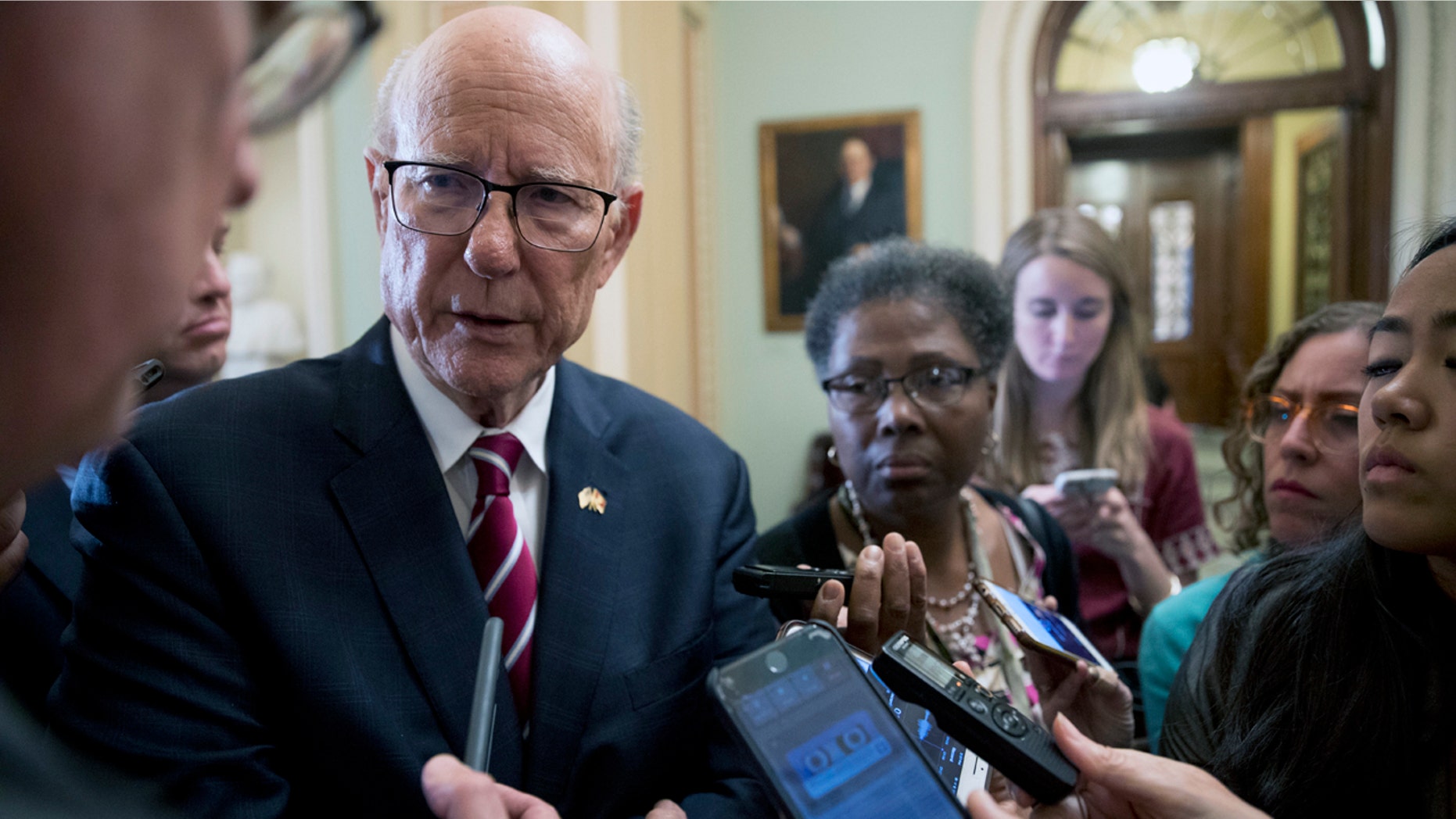 Senate Agriculture Committee chairman Pat Roberts, R-Kan., talks to reporters on Capitol Hill Tuesday.