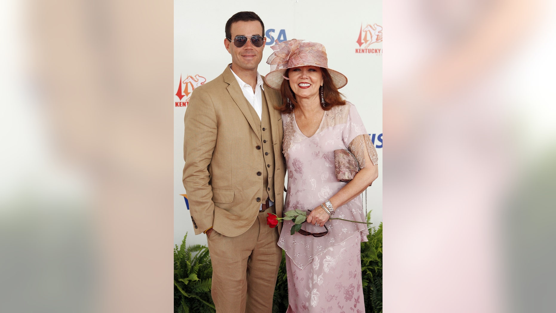 FILE - In this May 3, 2008, file photo, Carson Daly and his mother Pattie Daly Caruso arrive at the 134th Kentucky Derby at Churchill Downs in Louisville, Ky. Daly announced on Monday, Sept. 18, 2017, his mother died the previous day. (AP Photo/David Harpe, File)