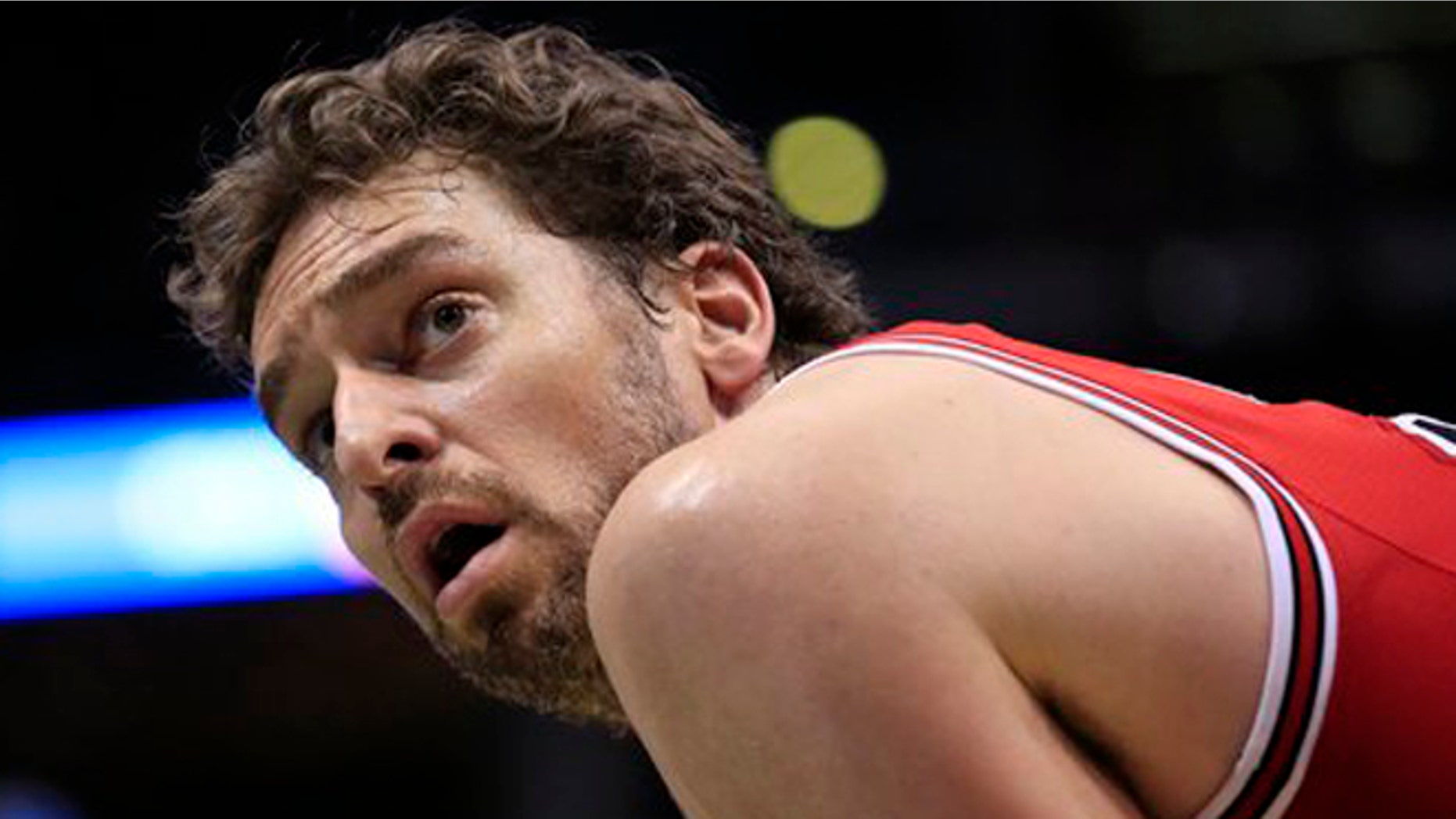 FILE - This is a Sunday, April 3, 2016 file photo of Chicago Bulls center Pau Gasol looks up as the Milwaukee Bucks take a free throw during the second half of an NBA basketball game, in Milwaukee . Pau Gasol says he is considering not playing at the Olympics because of the Zika virus. The Spanish basketball player says there is too much uncertainty about the situation in Brazil and anyone going to Rio de Janeiro for the games should "think about" whether it's worth the risk. (AP Photo/Darren Hauck, File)