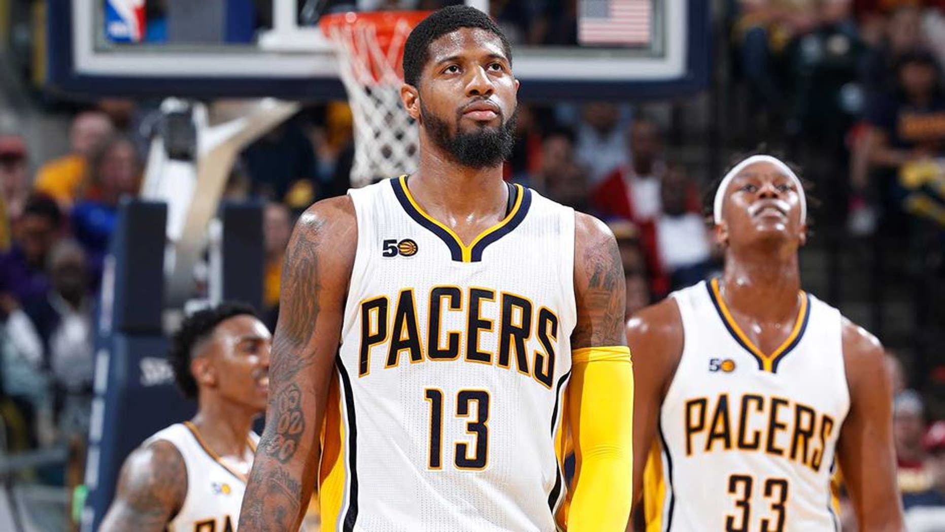INDIANAPOLIS, IN - APRIL 23: Paul George #13 and Myles Turner #33 of the Indiana Pacers react in the second half of Game Four of the Eastern Conference Quarterfinals during the 2017 NBA Playoffs against the Cleveland Cavaliers at Bankers Life Fieldhouse on April 23, 2017 in Indianapolis, Indiana. The Cavaliers defeated the Pacers 106-102 to sweep the series 4-0. NOTE TO USER: User expressly acknowledges and agrees that, by downloading and or using the photograph, User is consenting to the terms and conditions of the Getty Images License Agreement. (Photo by Joe Robbins/Getty Images)