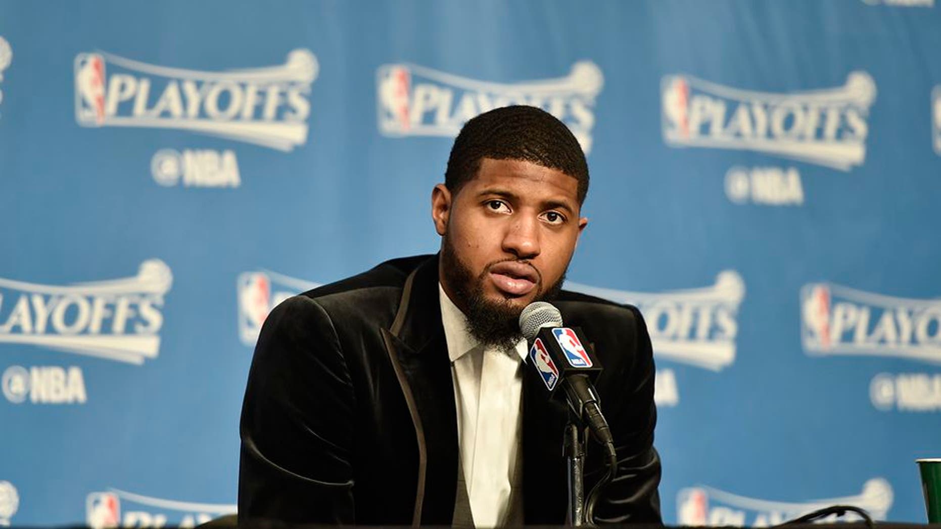 CLEVELAND, OH - APRIL 15: Paul George #13 of the Indiana Pacers speaks to the media after a game against the Cleveland Cavaliers in Round One of the Eastern Conference Playoffs during the 2017 NBA Playoffs on April 15, 2017 at Quicken Loans Arena in Cleveland, Ohio. NOTE TO USER: User expressly acknowledges and agrees that, by downloading and/or using this photograph, user is consenting to the terms and conditions of the Getty Images License Agreement. Mandatory Copyright Notice: Copyright 2017 NBAE (Photo by David Liam Kyle/NBAE via Getty Images)