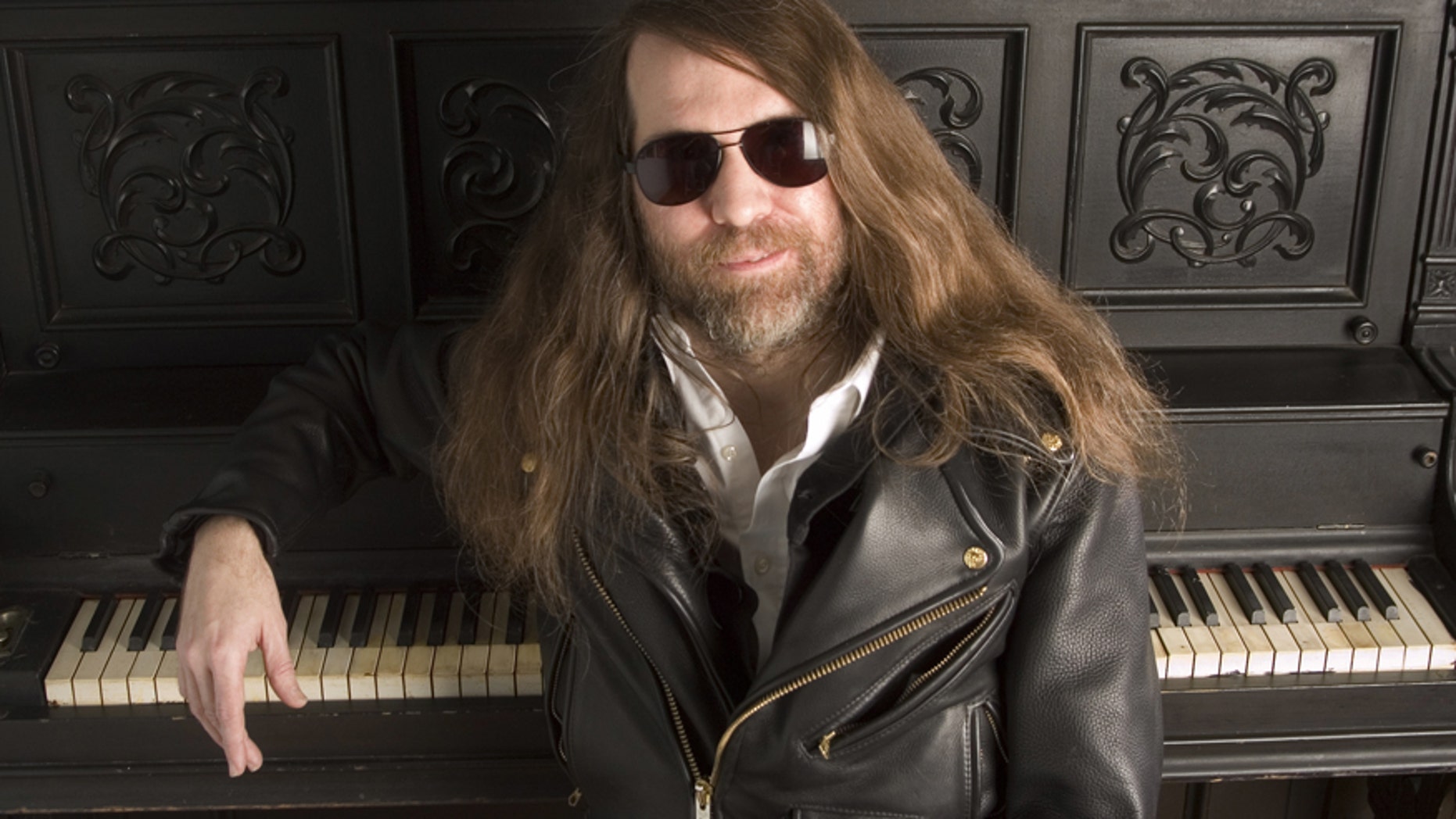 In this Oct. 20, 2006, file photo, Paul O'Neill of Trans-Siberian Orchestra, poses in New York.