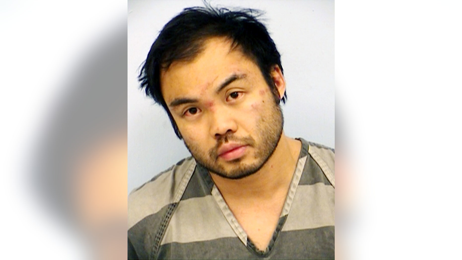 This handout photo provided by the Austin Police Department shows Paul Qui. The 2012 winner of the Bravo TV show "Top Chef' who has been charged with assaulting his girlfriend in Texas. Austin police say Qui was arrested Saturday, March 19, 2016, on misdemeanor charges of unlawful restraint and of assault causing injury-family violence. (Austin Police Department via AP)