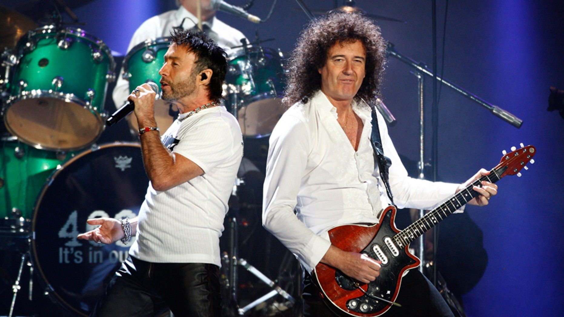Queen's Brian May (R) and Paul Rodgers (L) perform in Hyde Park, London.