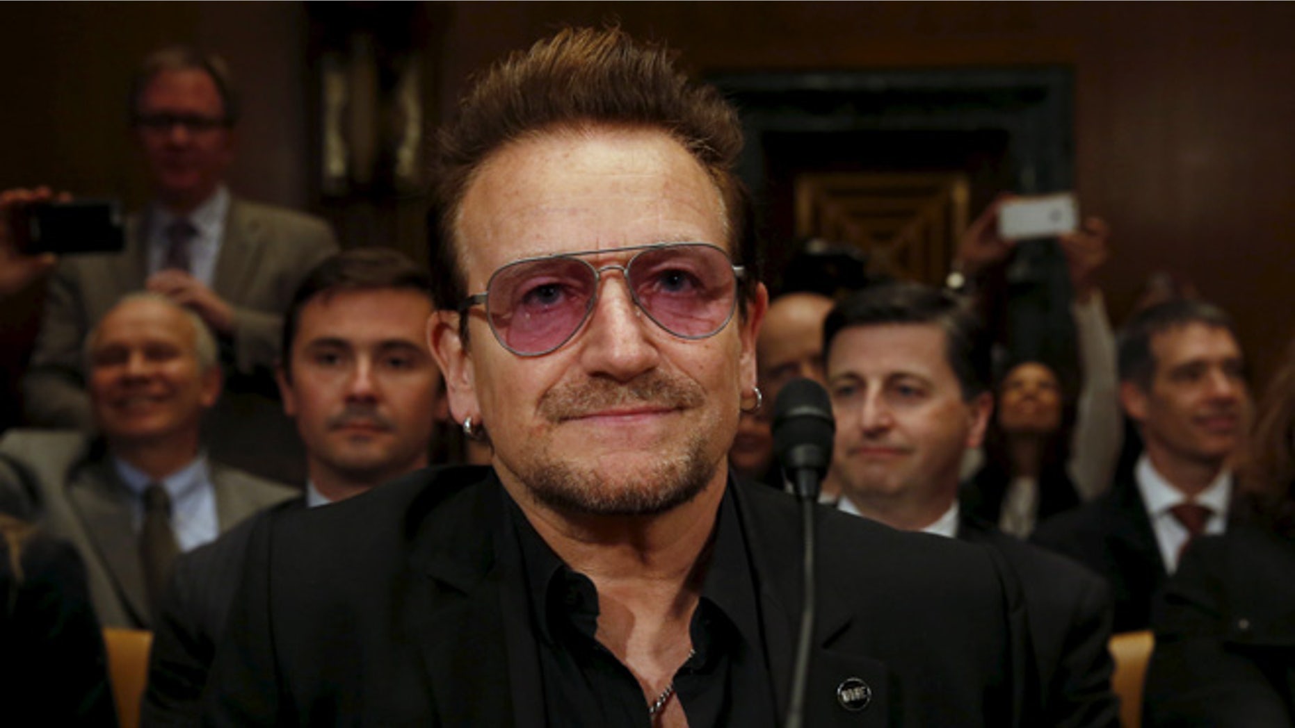 U2 lead singer Bono attends a Senate subcommittee hearing on Capitol Hill. (Reuters)