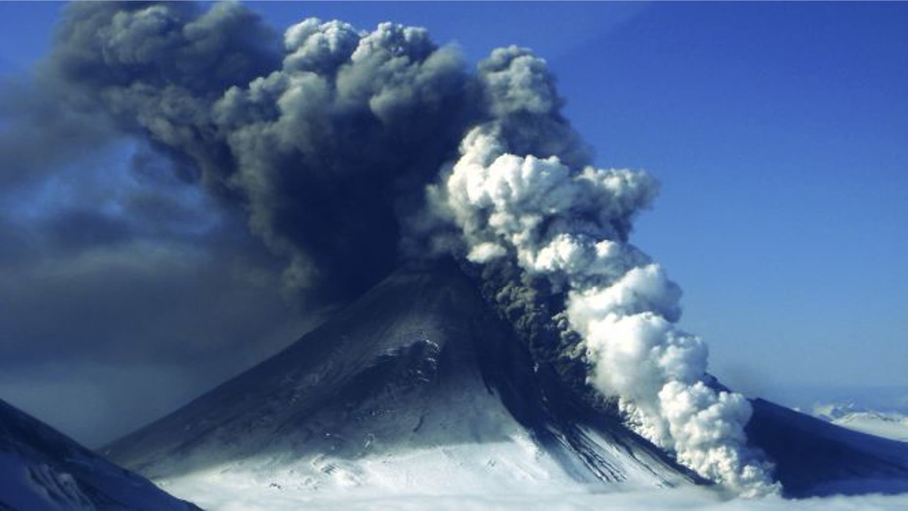 May 16, 2013: In this photo provided by the Alaskan Volcano Observatory, the Pavlof volcano erupts, as seen from the air from the southwest in Cold Bay, Alaska.