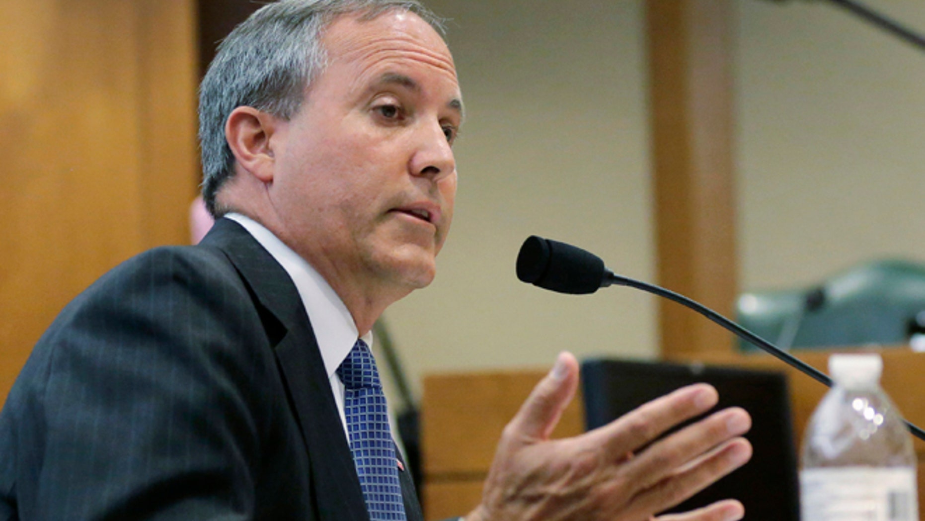 July 29, 2015: Texas Attorney General Ken Paxton speaks during a hearing in Austin, Texas.