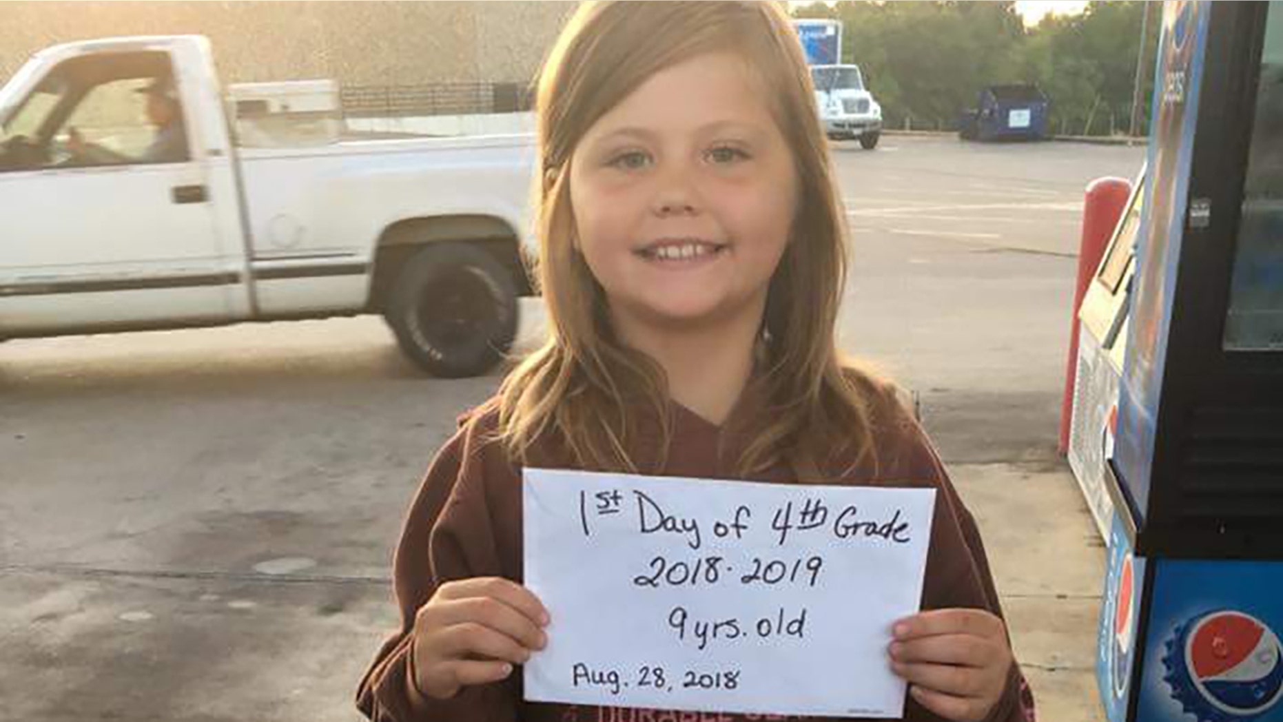 Payton Lynn Crustner, 9, was killed Tuesday in a car collision moments after posing for a first-day-of-school picture, reports said.