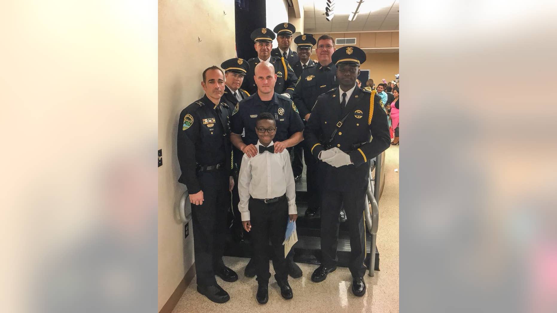 Nine of the Joe Crowder's former colleagues attended his son's 5th grade graduation on Friday.