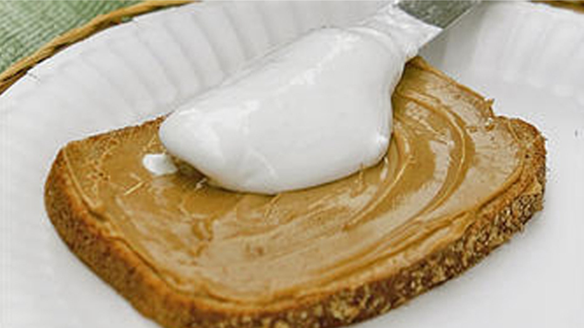 Ingredients of a Fluffernutter sandwich -- Marshmallow Fluff, peanut butter and bread -- are shown in Marlborough, Mass., Tuesday, June 20, 2006. The beloved New England sandwich now finds itself at the center of a sticky political debate at the Massachusetts Statehouse. (AP Photo/Bill Sikes)