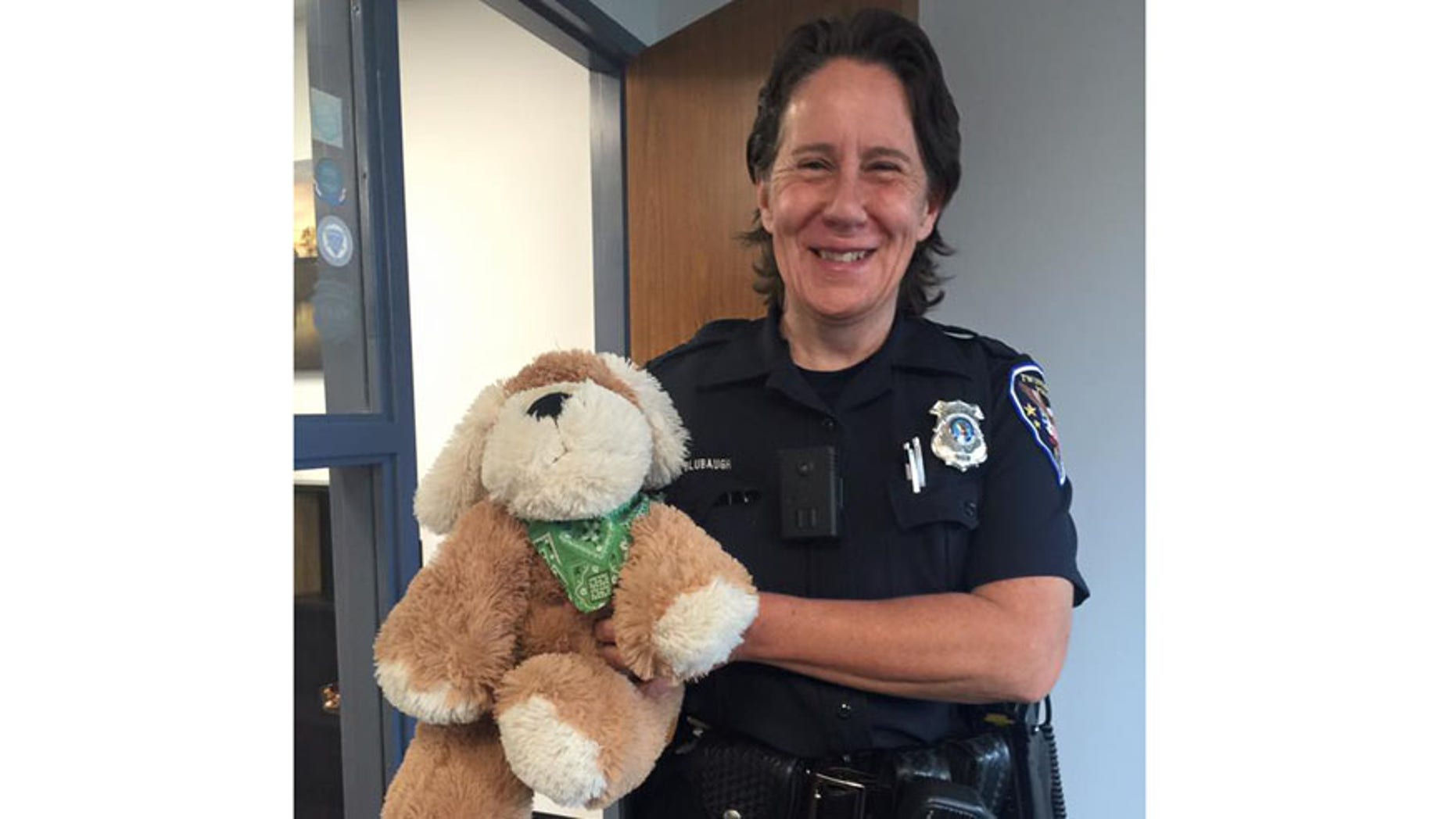 Twinsburg Police Officer April Blubaugh and Peanut. (Twinsburg Police Department)