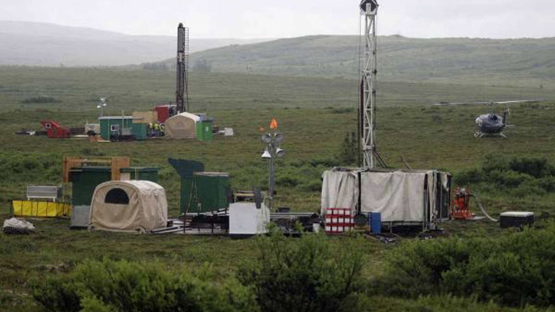 Workers with the Pebble Mine project test drill in the Bristol Bay region near the village of Iliamma.