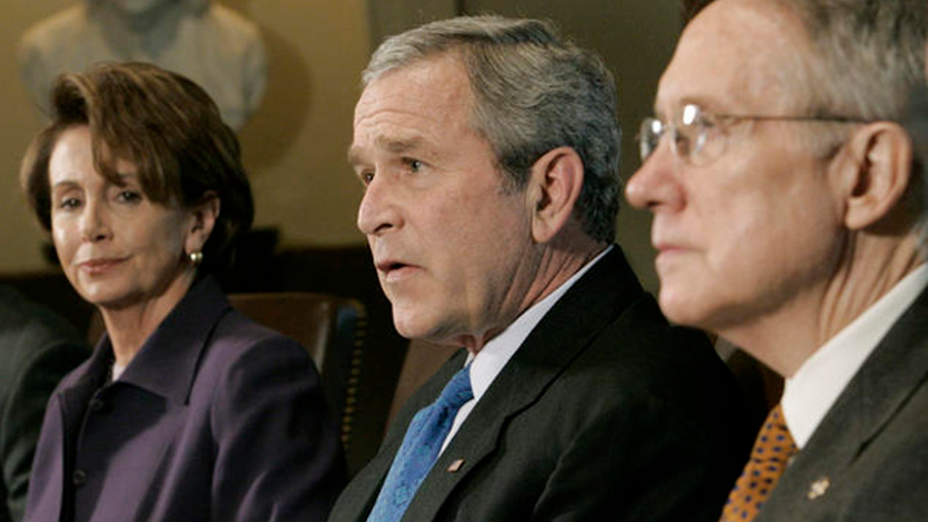 House Speaker Nancy Pelosi, President George W. Bush, and Senate Majority Leader Harry Reid during a meeting at the White House, April 18, 2007. (AP)