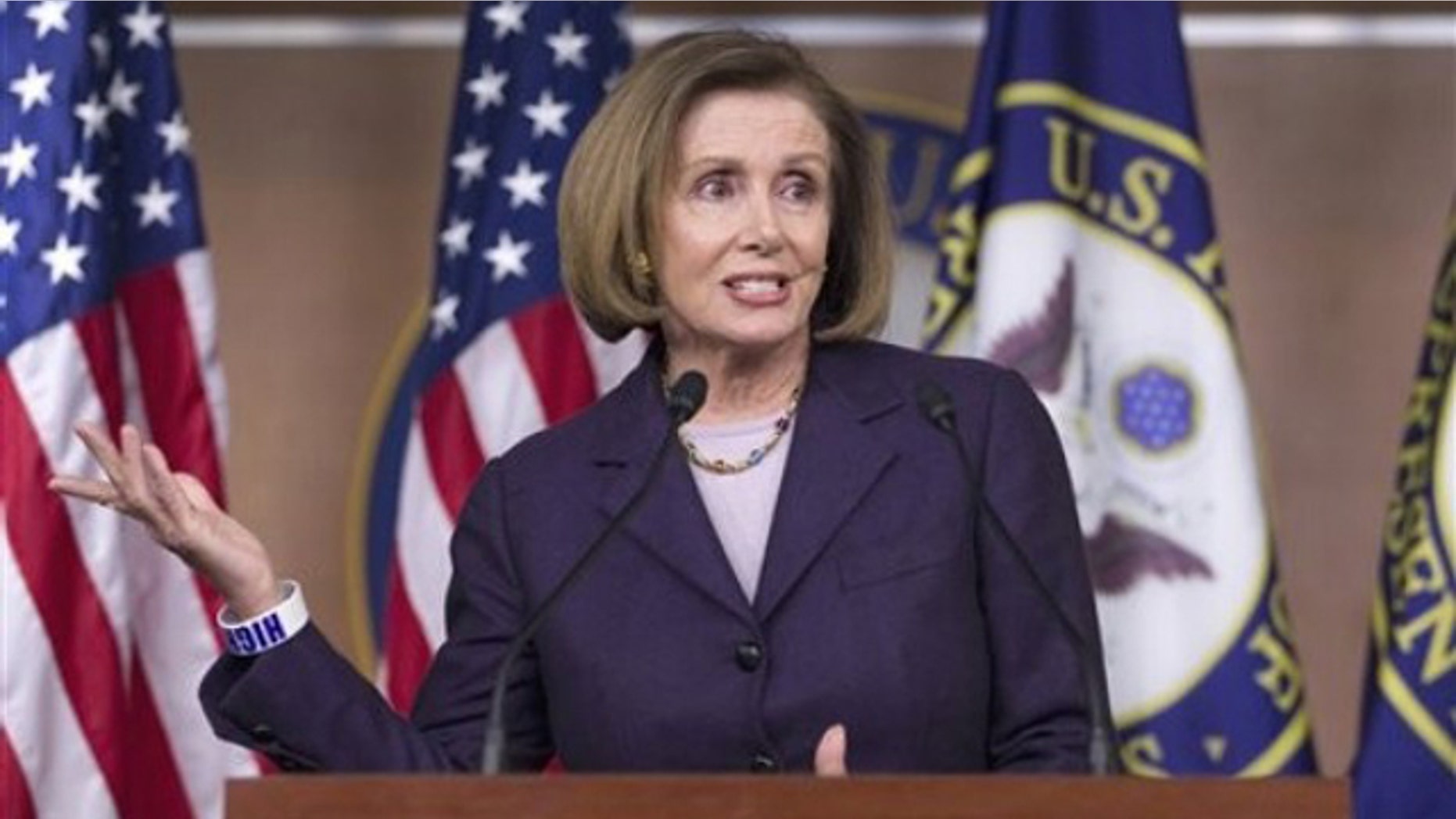 House Minority Leader Nancy Pelosi gestures during a news conference on Capitol Hill April 14.