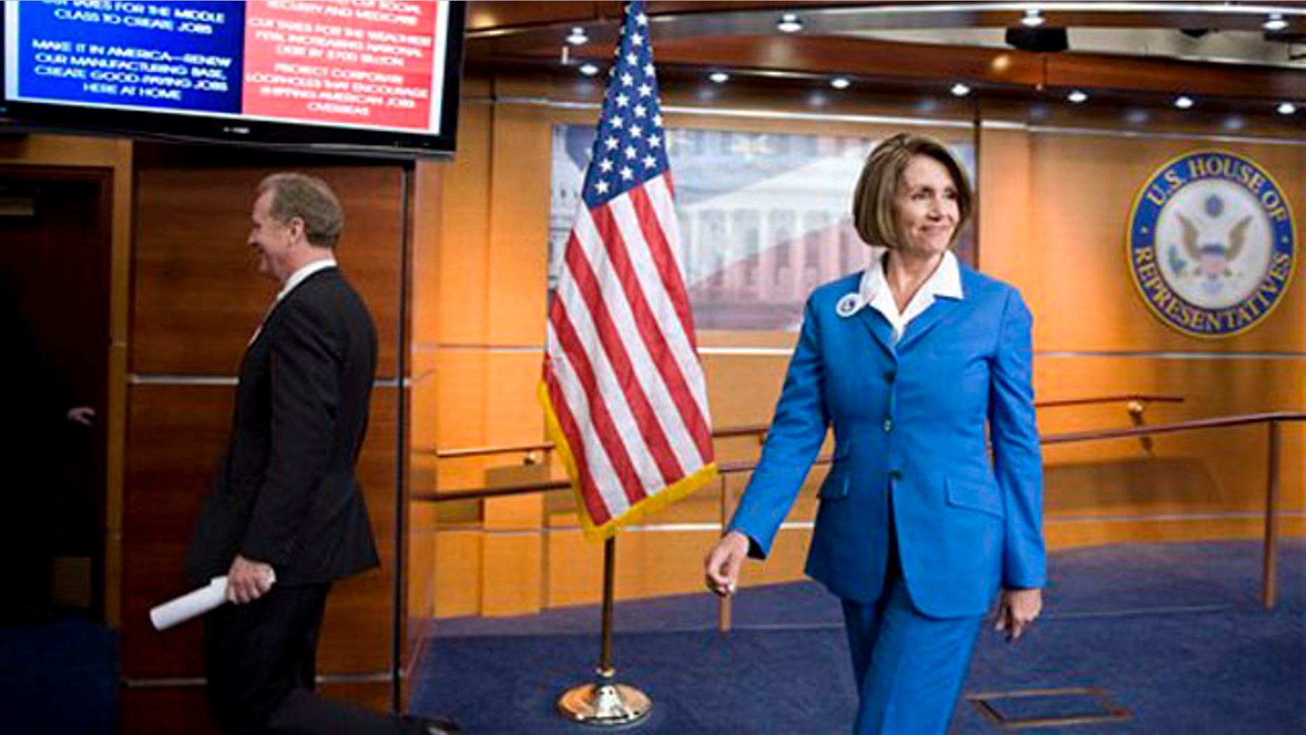 House Speaker Nancy Pelosi, right, and Rep. Chris Van Hollen, left, leave a news conference on Capitol Hill Sept. 30. (AP Photo)