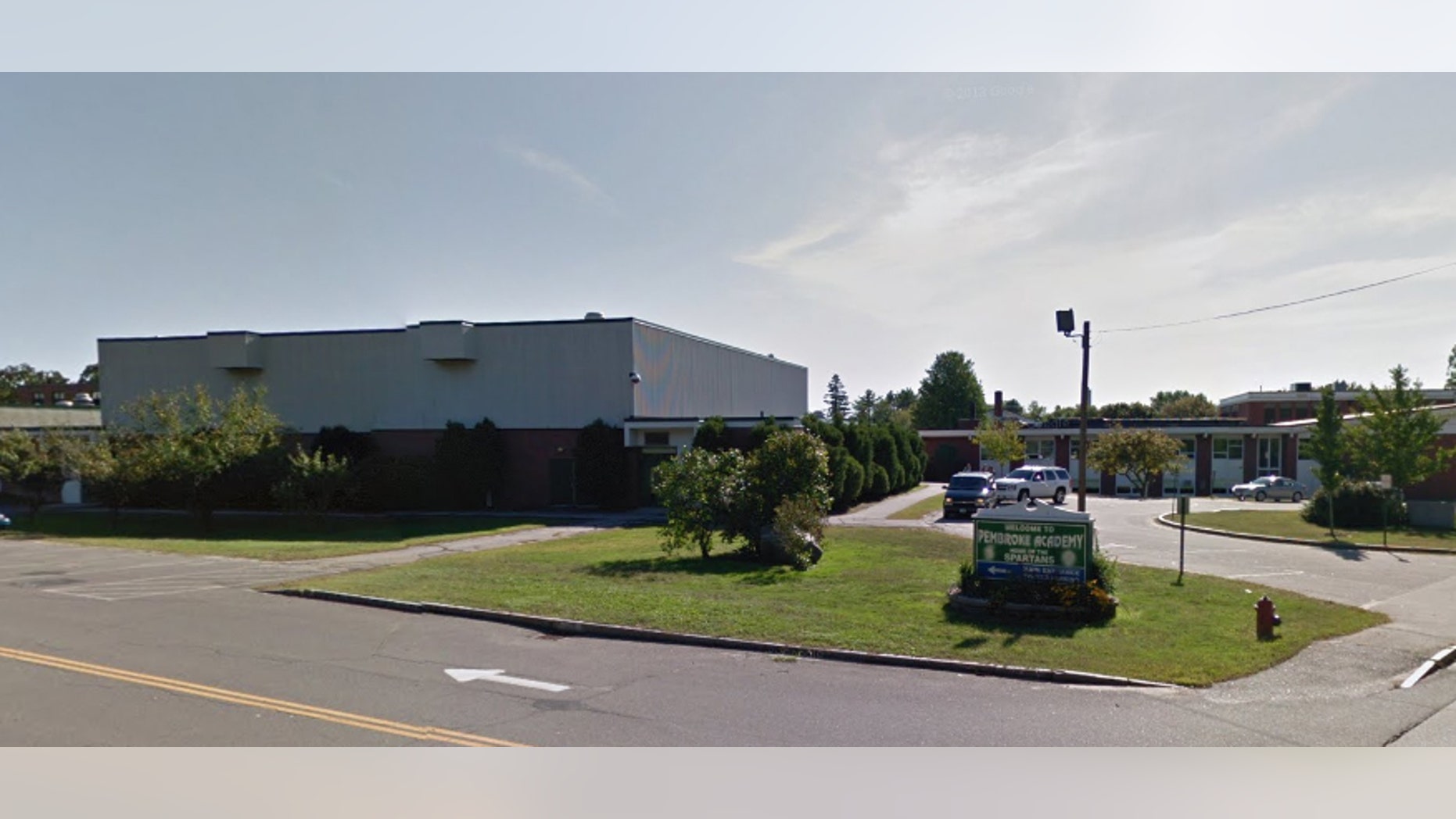 A top administrator at New Hampshire's Pembroke Academy resigned after a heroin arrest.