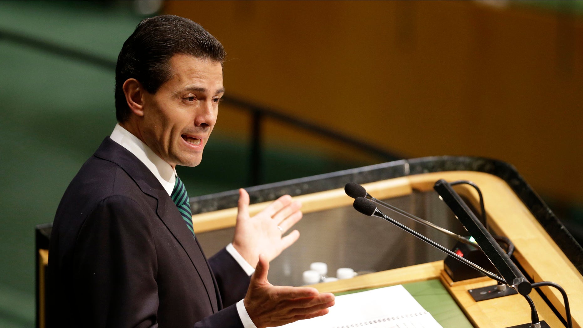 FILE - In this Sept. 27, 2015, file photo, Mexican President Enrique Pena Nieto addresses the 2015 Sustainable Development Summit, at United Nations headquarters. Pena Nieto said Monday, Nov. 9, 2015, that he opposes any eventual legalization of marijuana, five days after the Supreme Court ruled in favor of four people who wanted to grow pot for personal use.(AP Photo/Seth Wenig, File)