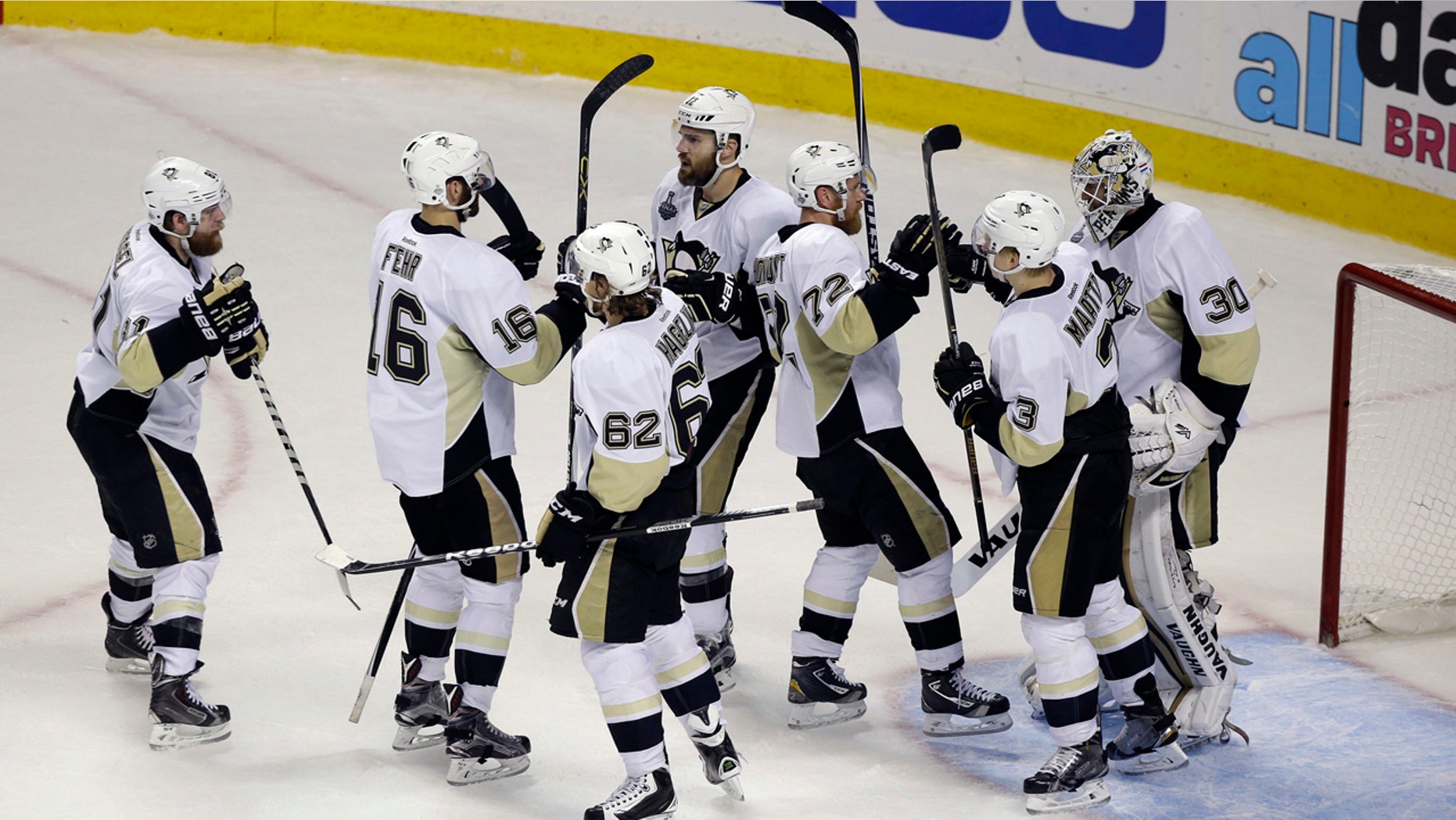 June 6, 2016: The Pittsburgh Penguins celebrate at the end of Game 4 of the NHL Stanley Cup Final against the San Jose Sharks in San Jose, Calif.