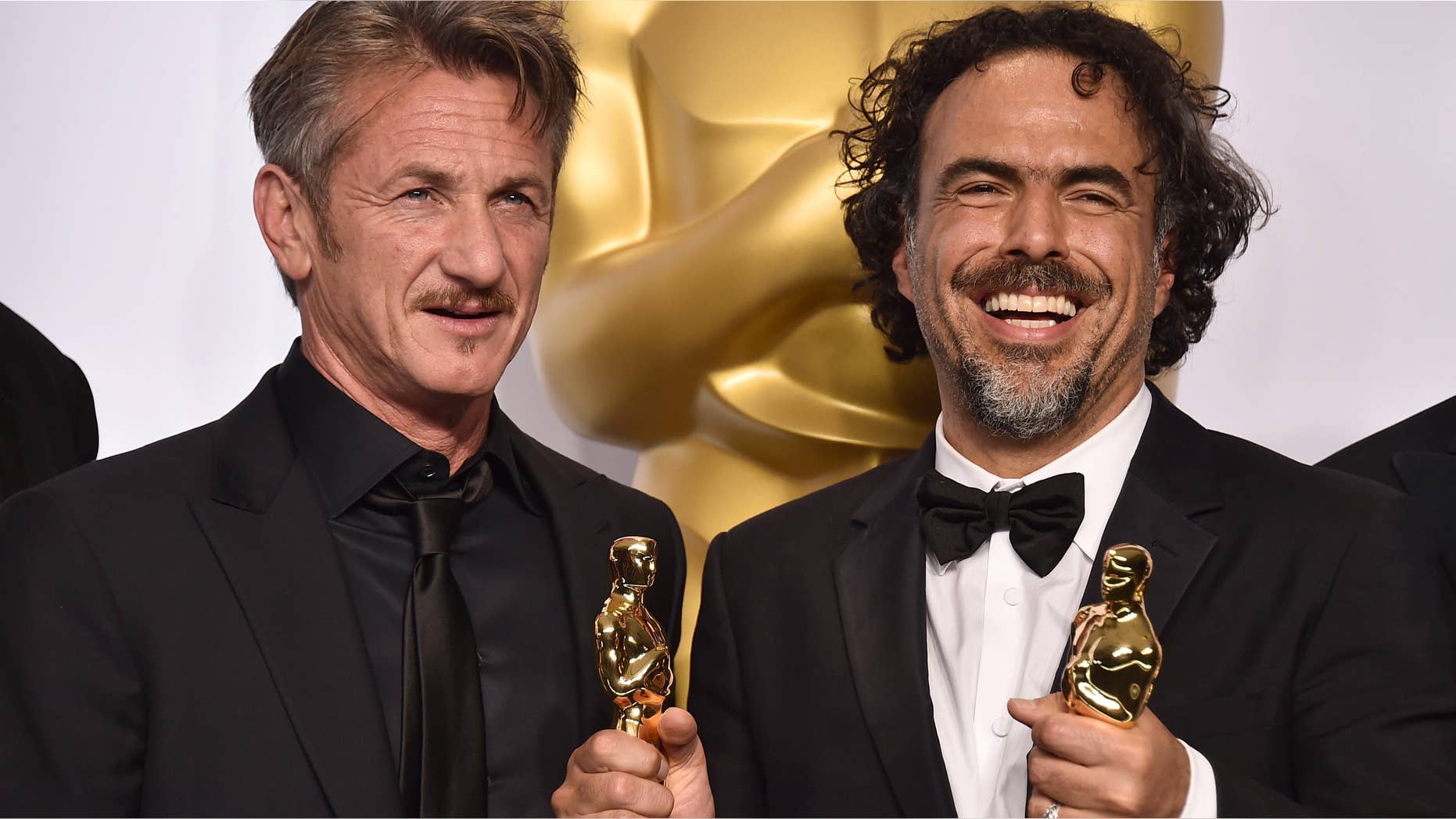 Feb. 22, 2015: Presenter Sean Penn, left, and filmmaker Alejandro Iñárritu pose in the press room after winning multiple awards including best original screenplay, best director and best picture for “Birdman: Or (The Unexpected Virtue of Ignorance)," at the Oscars in Los Angeles.