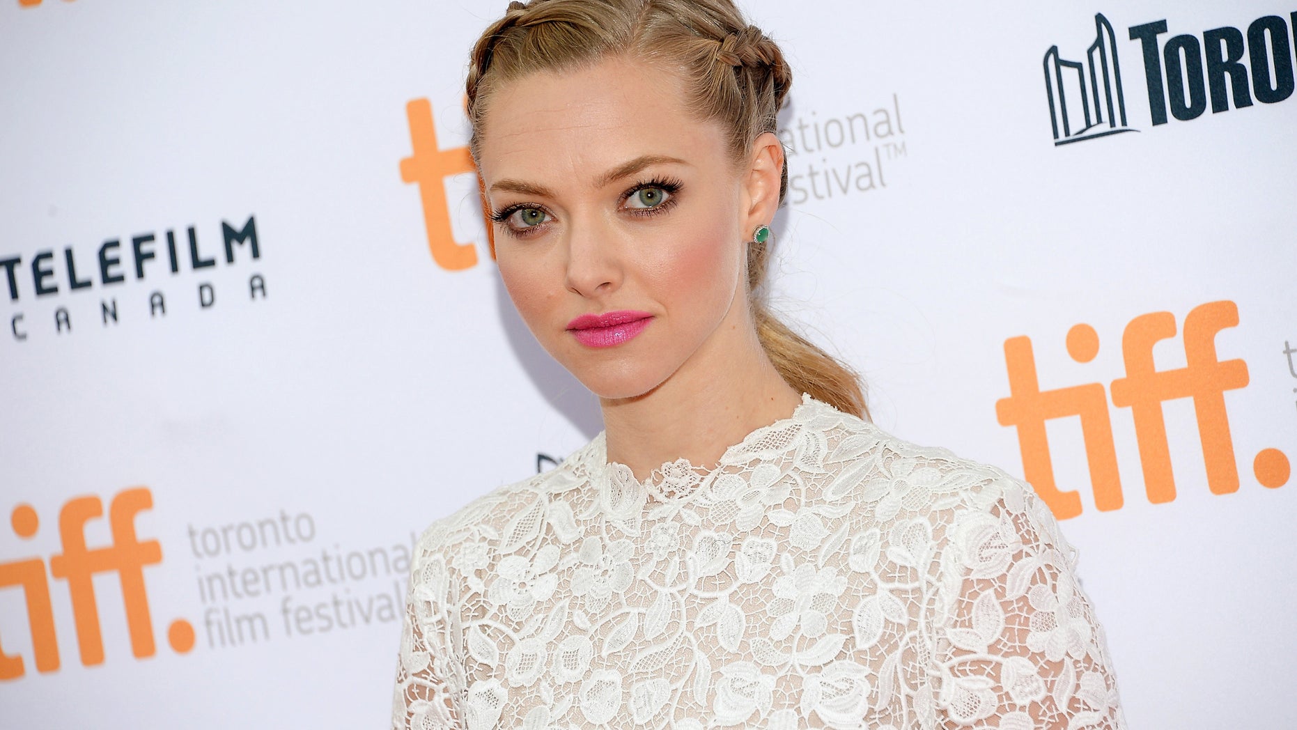 In this Sept. 6, 2014 file photo, actress Amanda Seyfried attends the "While We're Young" premiere during the Toronto International Film Festival in Toronto.