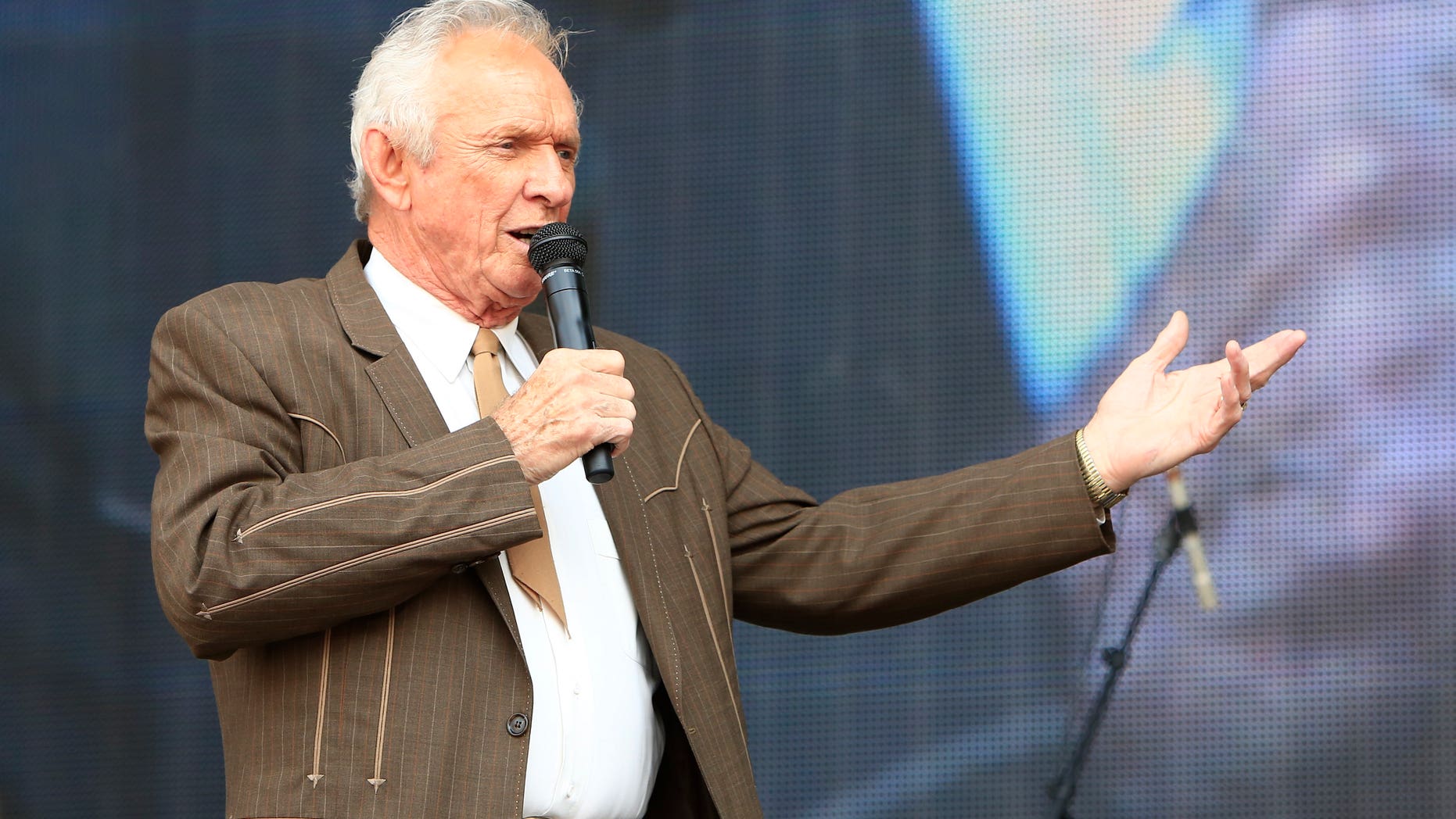 In this July 6, 2013, file photo, Mel Tillis performs at the Oklahoma Twister Relief Concert at the Gaylord Family-Oklahoma Memorial Stadium in Norman, Okla.
