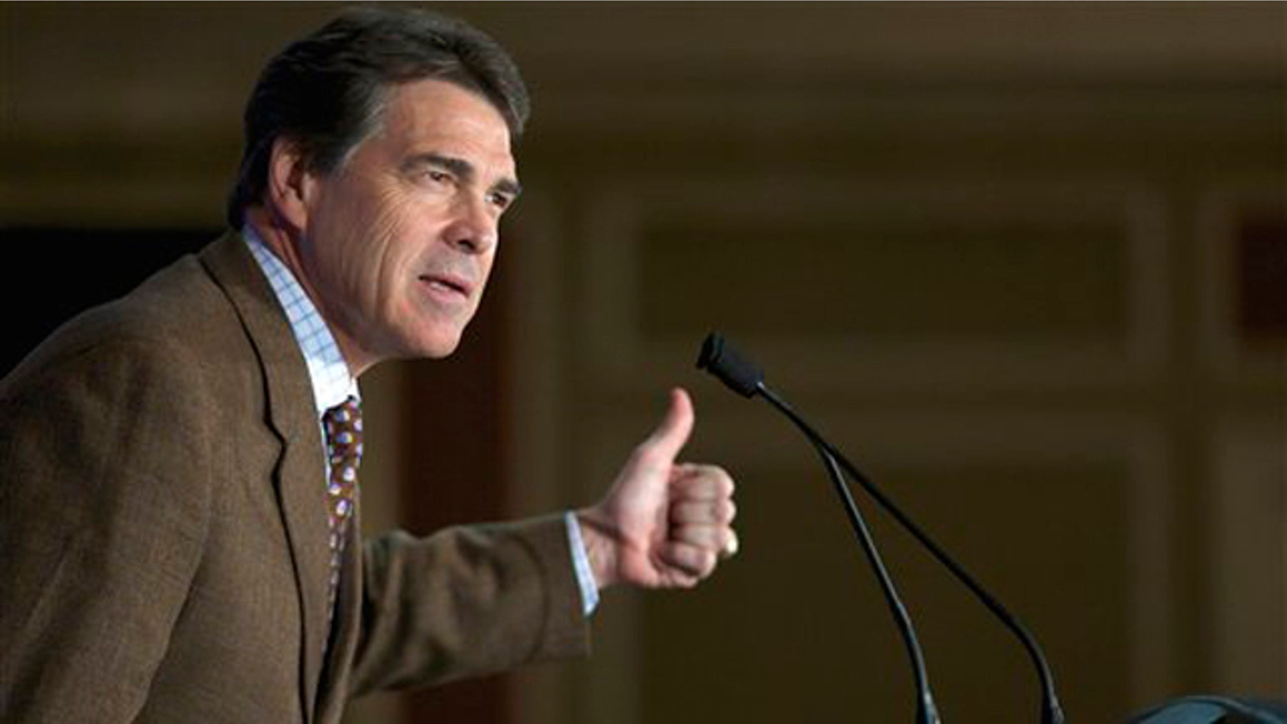 Texas Gov. Rick Perry speaks to members of the South Carolina GOP during a lunch in Columbia, S.C., Aug. 19.