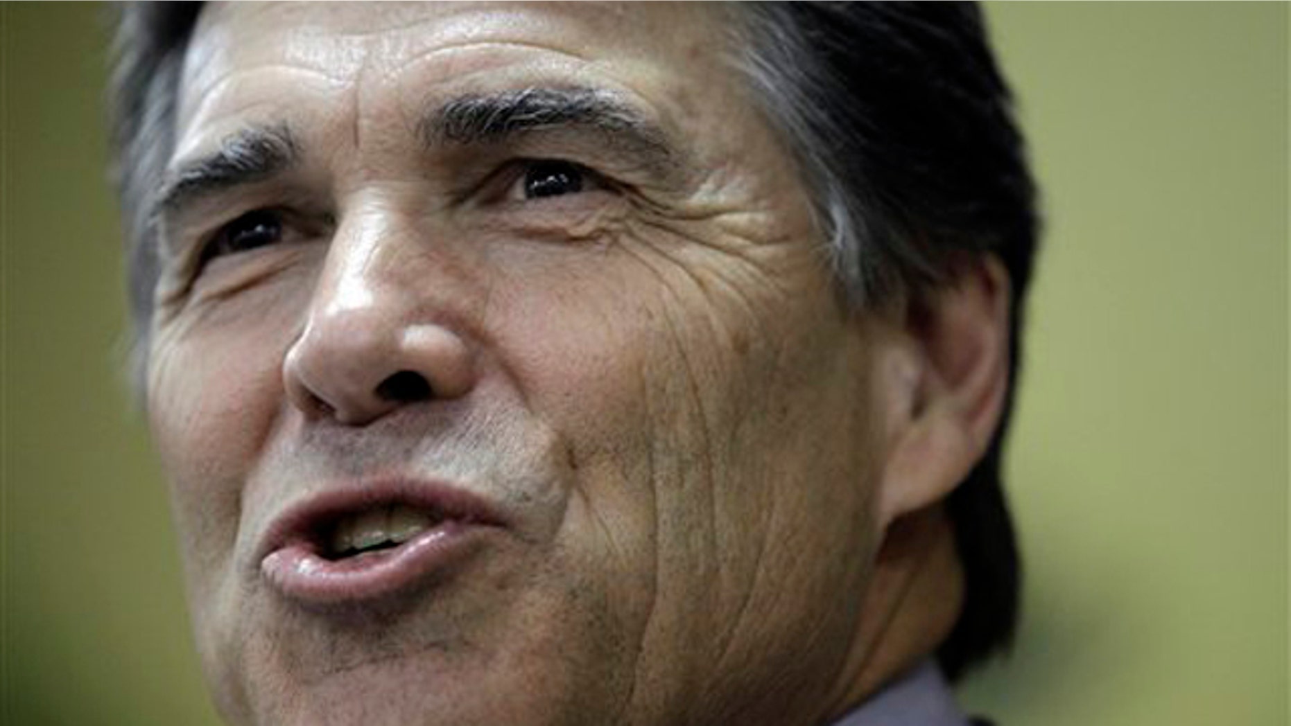 Gov. Rick Perry speaks after he was endorsed by the Texas Association of Realtors Aug. 30 in San Antonio. (AP Photo)