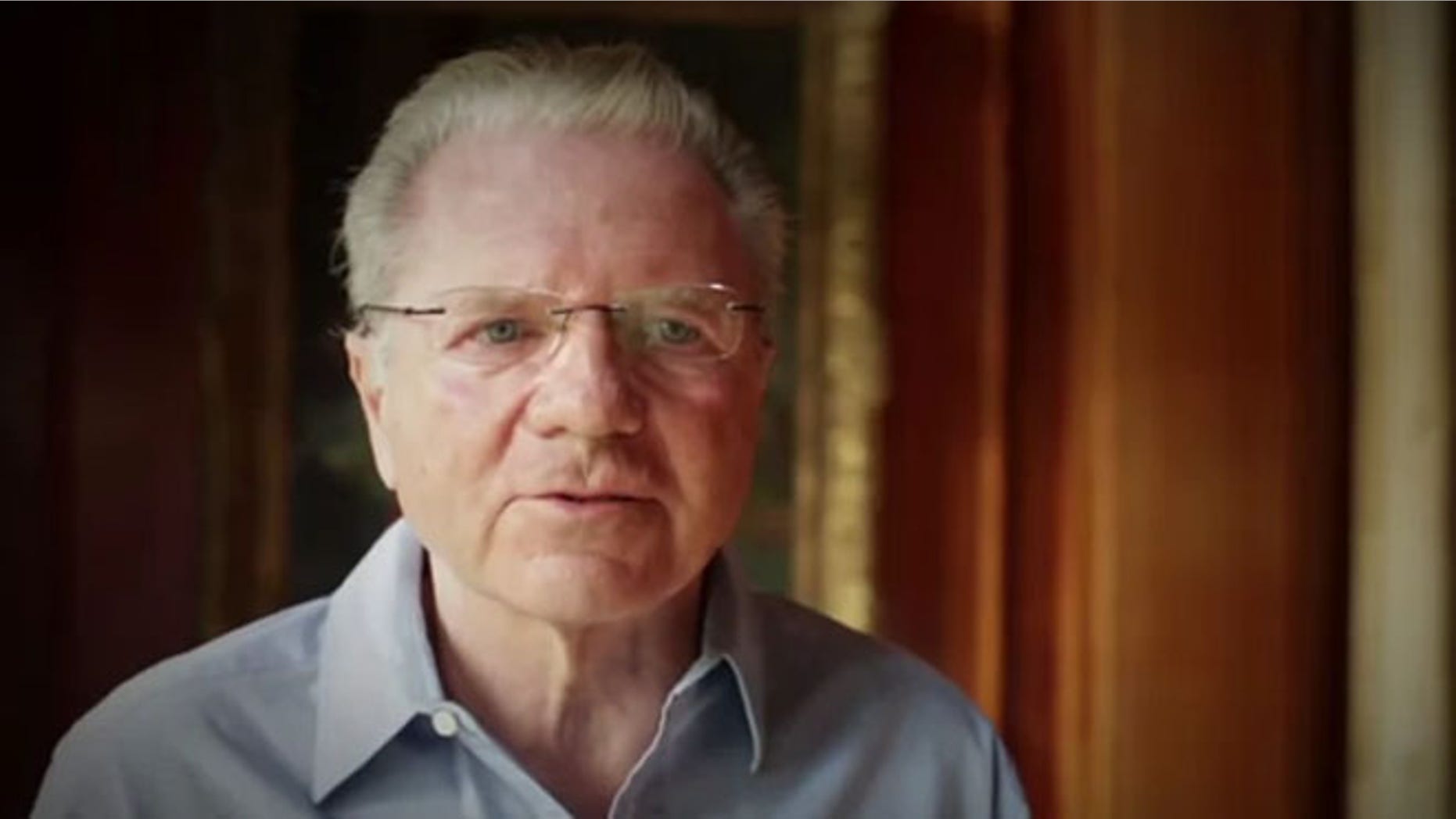 Shown here is Hungarian-born billionaire Thomas Peterffy, in an image from the ad he's financing.