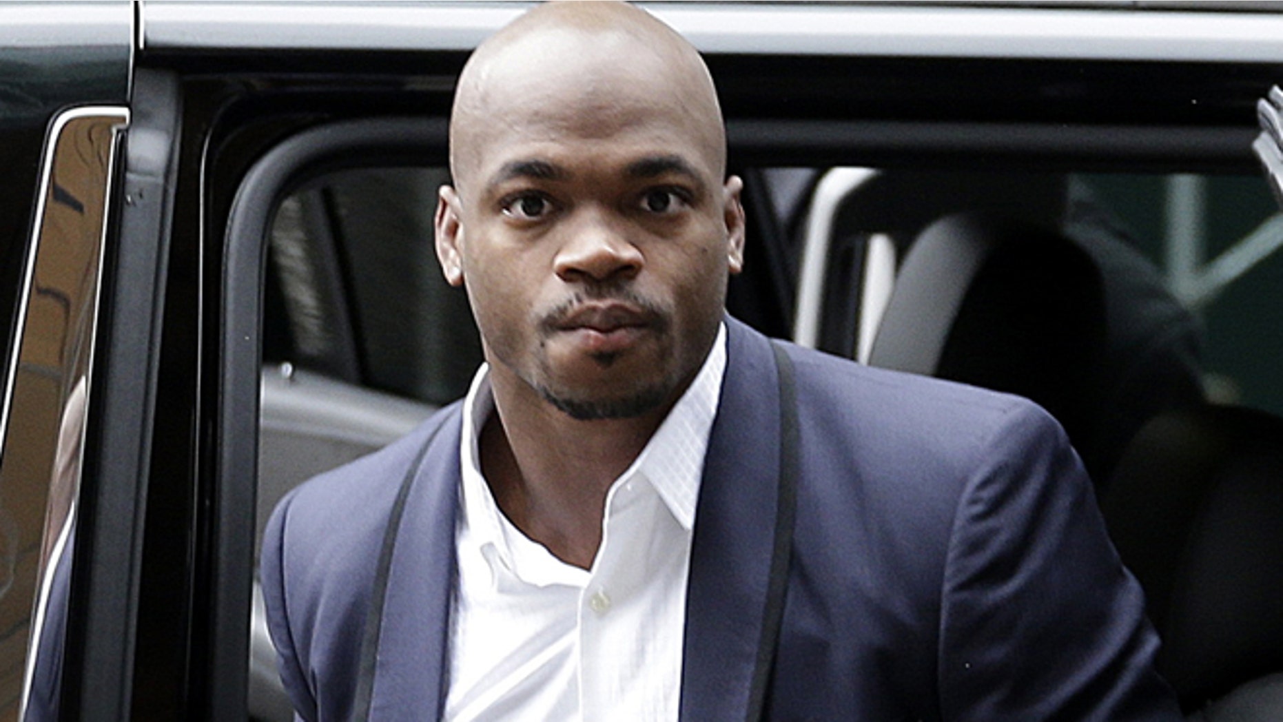 Dec. 2, 2014: Minnesota Vikings' Adrian Peterson arrives for a hearing for the appeal of his suspension in New York. (AP)