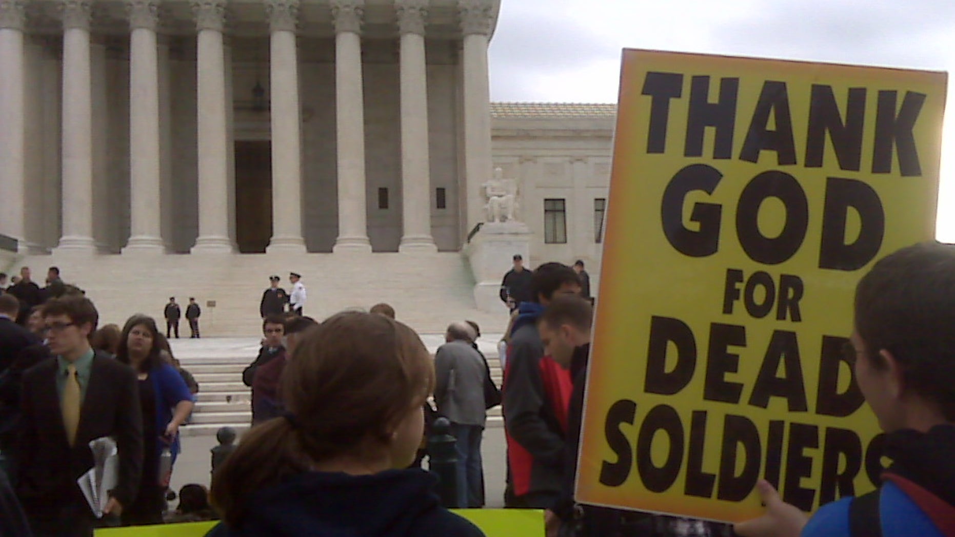 Oct. 6, 2010: Members of Westboro Baptist Church stand outside the U.S. Supreme Court as arguments are heard in the case of whether church members have a right to picket outside a marine's funeral.