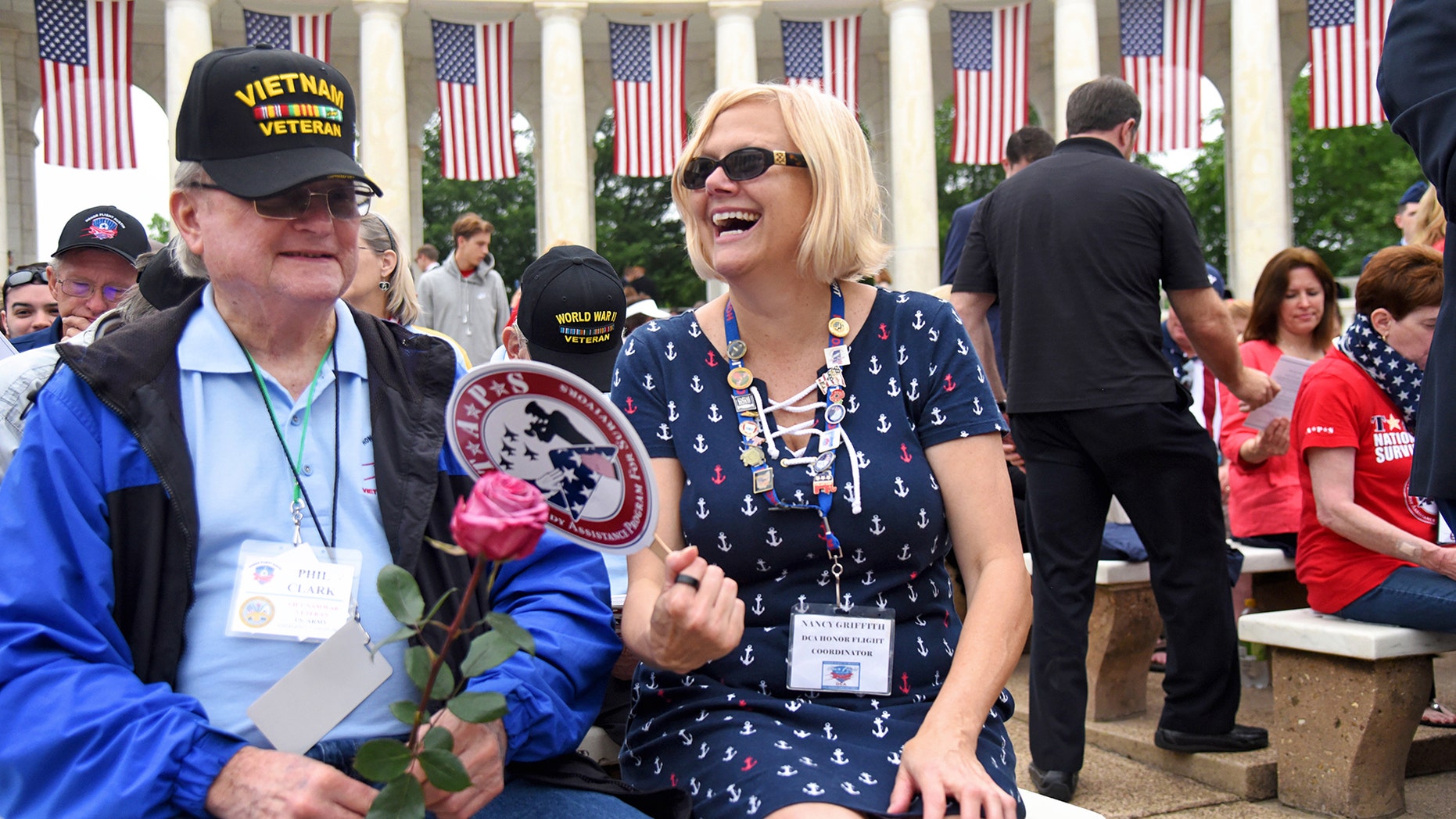 Vietnam veteran Phil Clark shares his war stories with Nancy Griffith, a longtime Honor Flight volunteer and guardian.