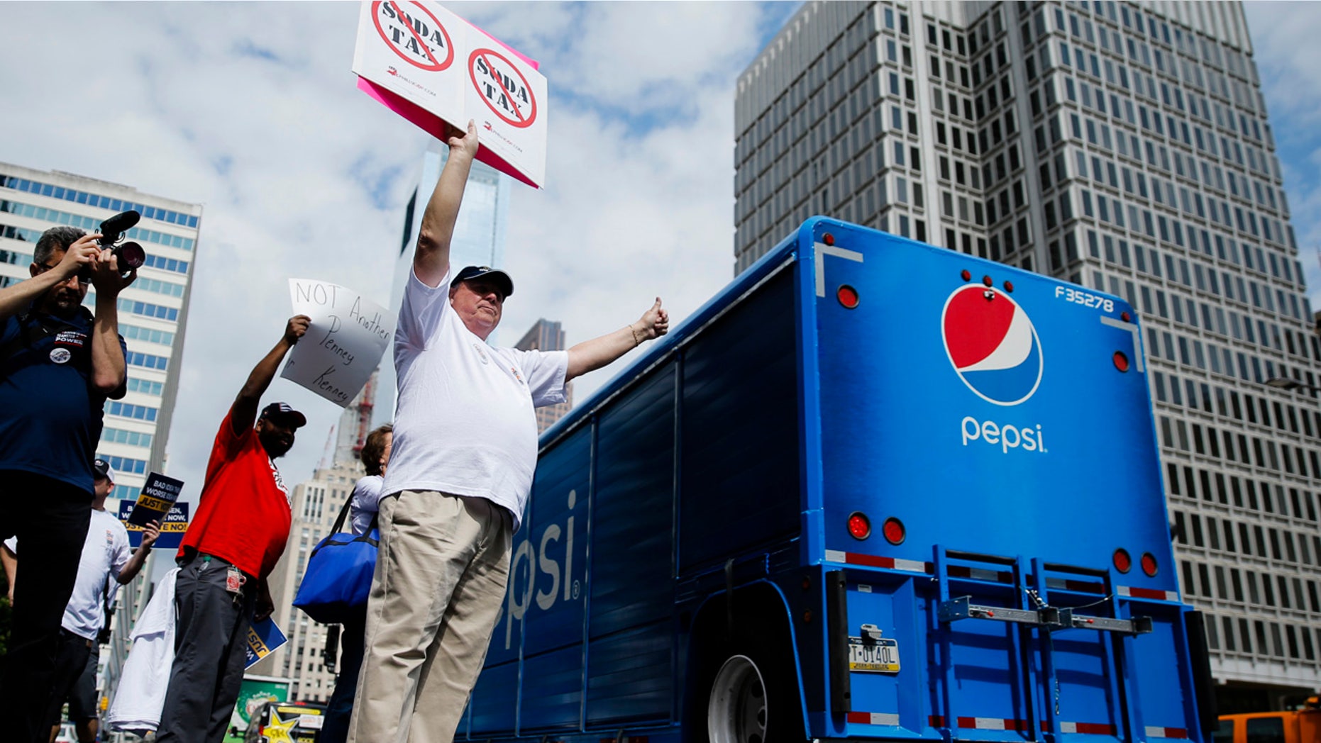 June 8, 2016: Opponents of a proposed sugary drink tax demonstrate outside City Hall in Philadelphia.