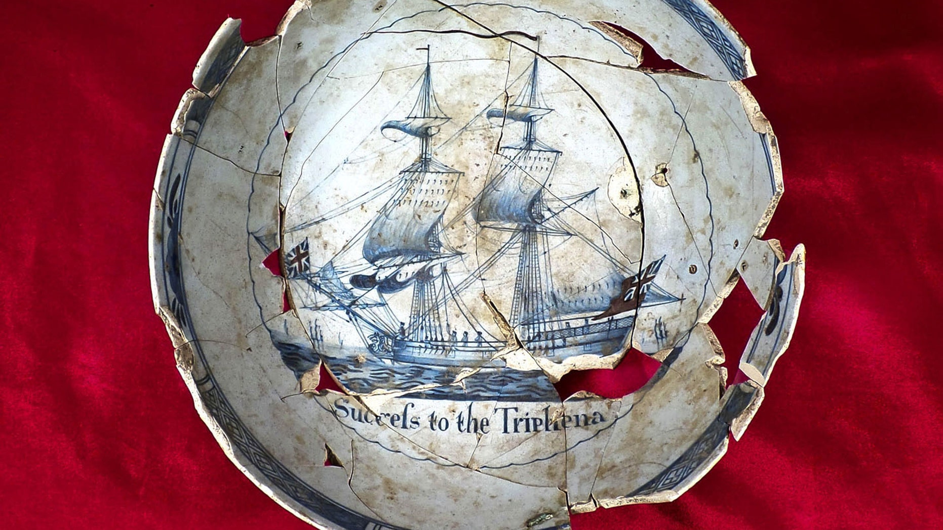 Punch bowl made out of tin glazed earthenware that has the message,“Success to the Tryphena” inscribed on the inside. (Commonwealth Heritage Group)