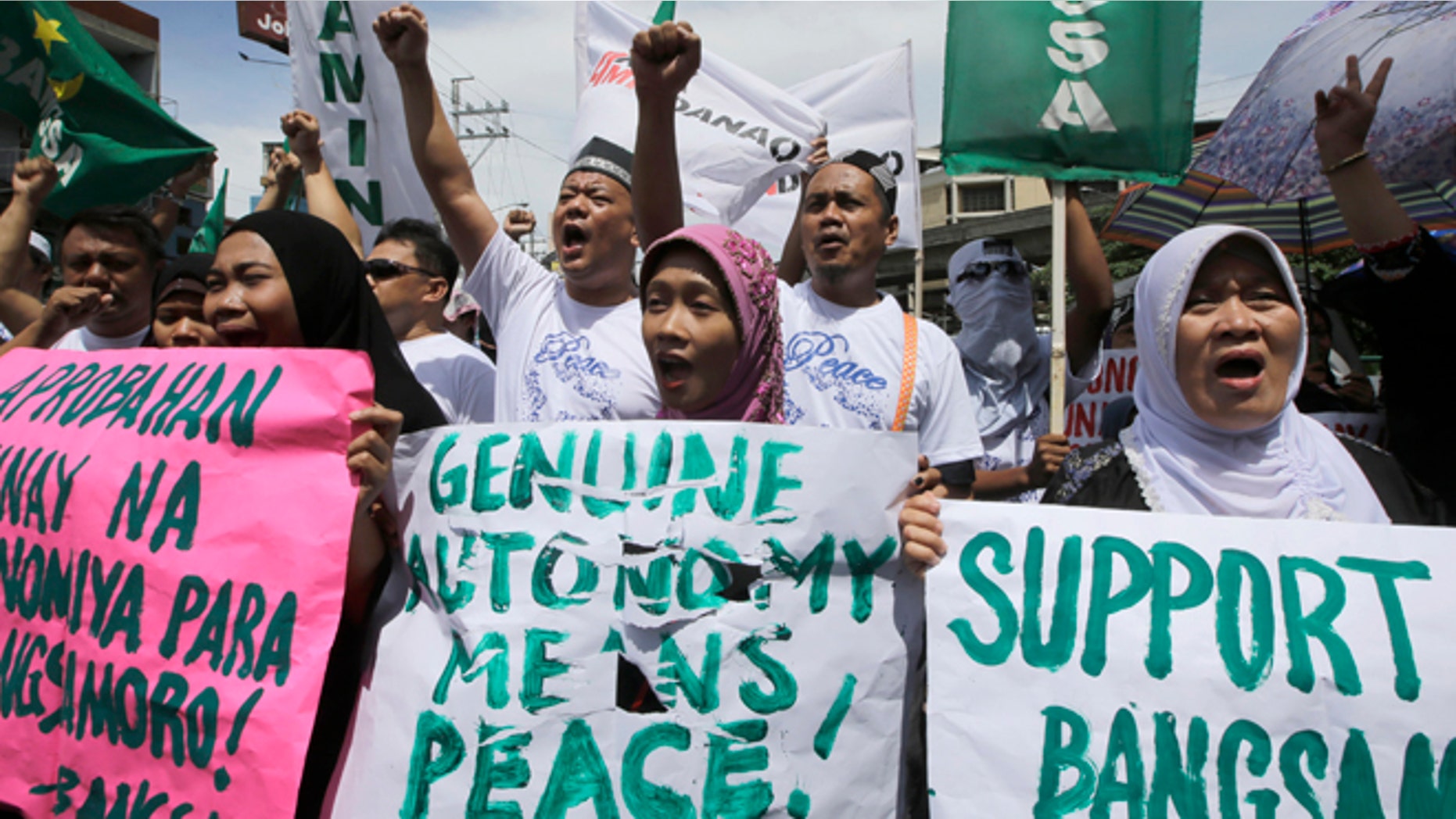 Sept. 10, 2014: Filipino Muslims shout slogans during a rally near the Presidential Palace in support of the Bangsamoro Basic Law draft that was formally submitted by Philippine President Benigno Aquino III to both houses of Congress in Manila, Philippines.