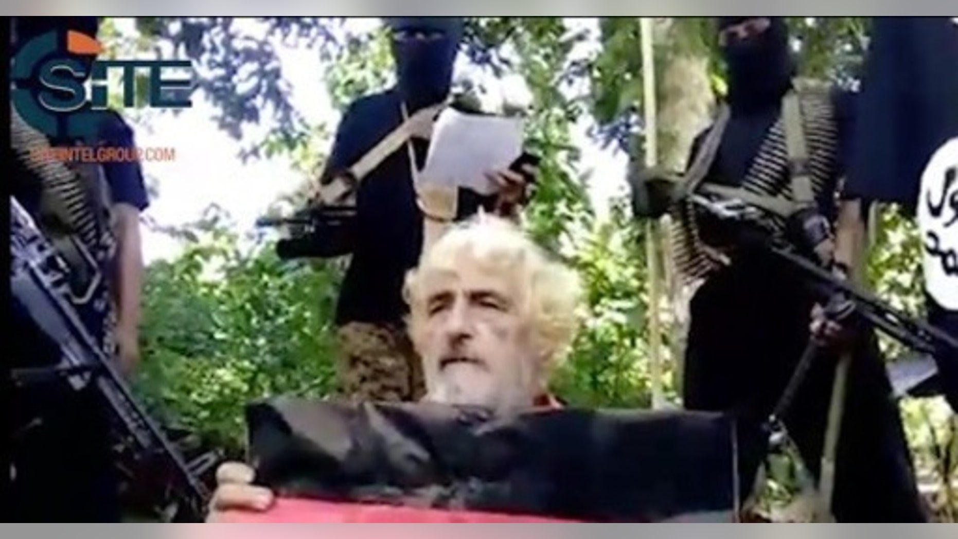 German hostage Jurgen Gustav Kantner kneels before his Islamic militant captors at an undisclosed location.