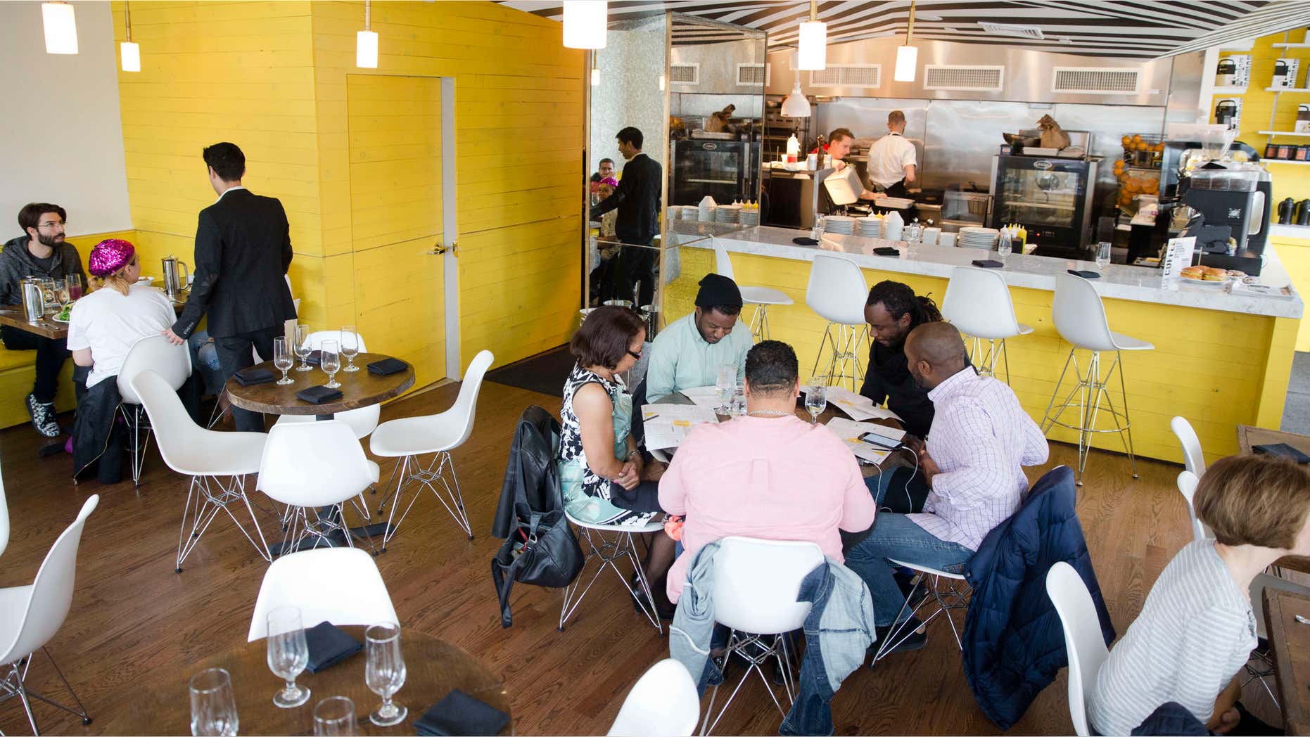 Nov. 25, 2014: Patrons eat at Girard a “No-Tip” restaurant in Philadelphia.