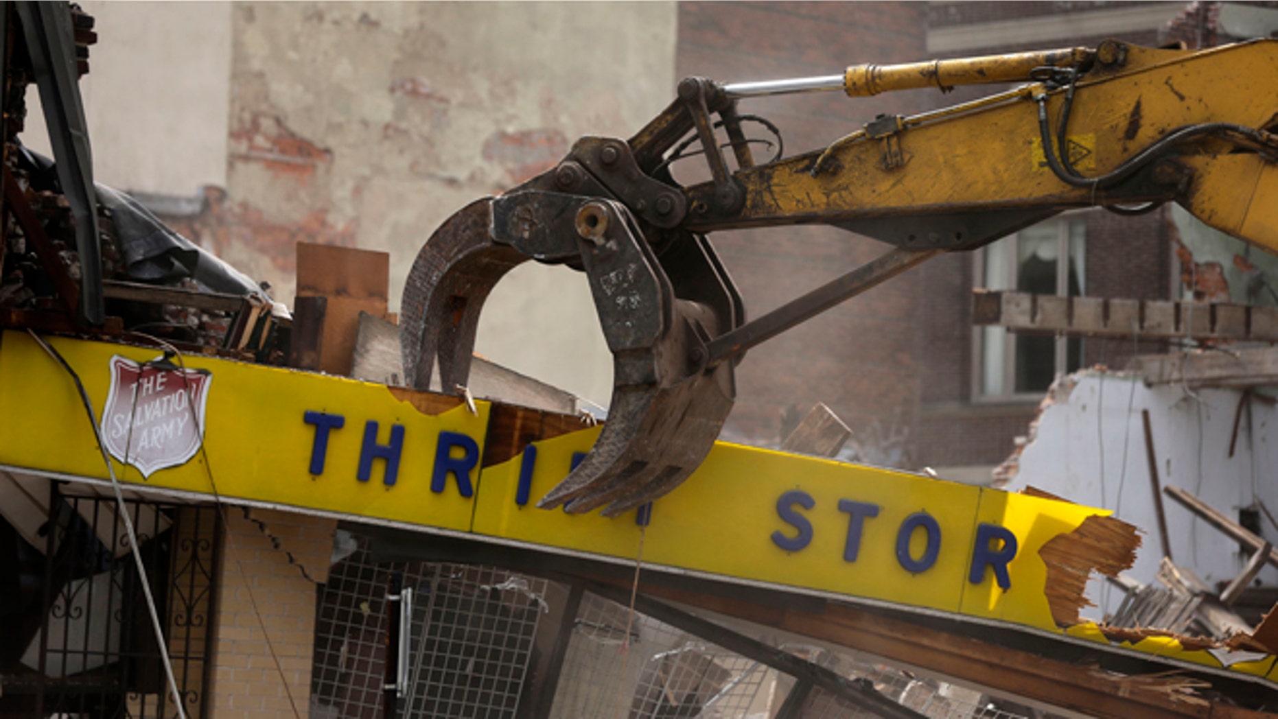 June 6, 2013: A Salvation Army Thrift store is demolished in the aftermath of a building collaps in Philadelphia.