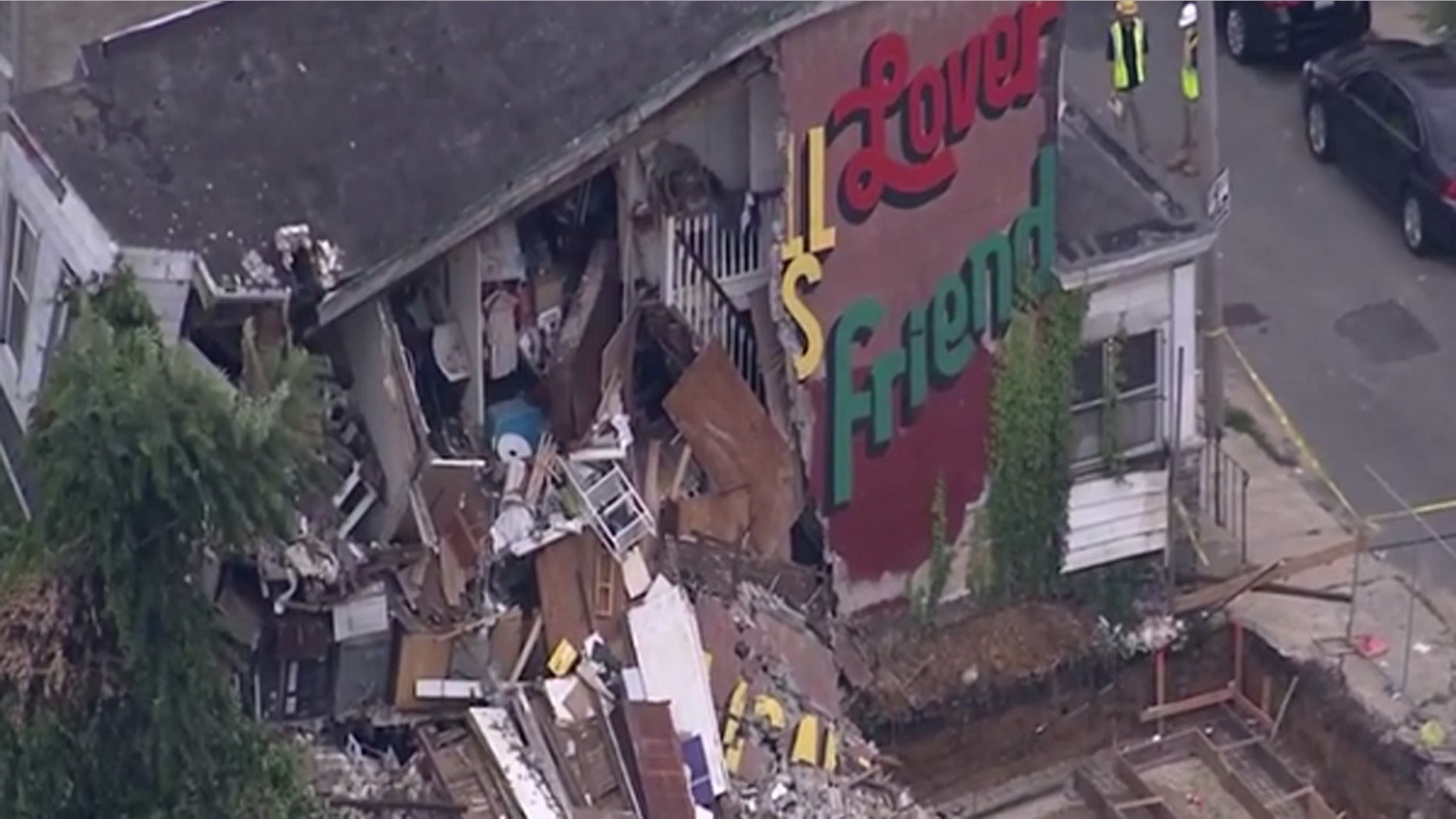 The scene after a row home partially collapsed in Philadelphia.
