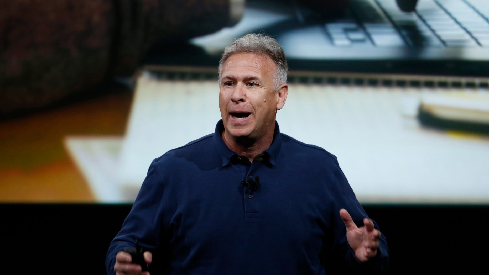 File photo - Phil Schiller, senior VP of worldwide marketing for Apple, introduces the iPad Pro with 9.7-inch display during an event at the Apple headquarters in Cupertino, California March 21, 2016. (REUTERS/Stephen Lam)
