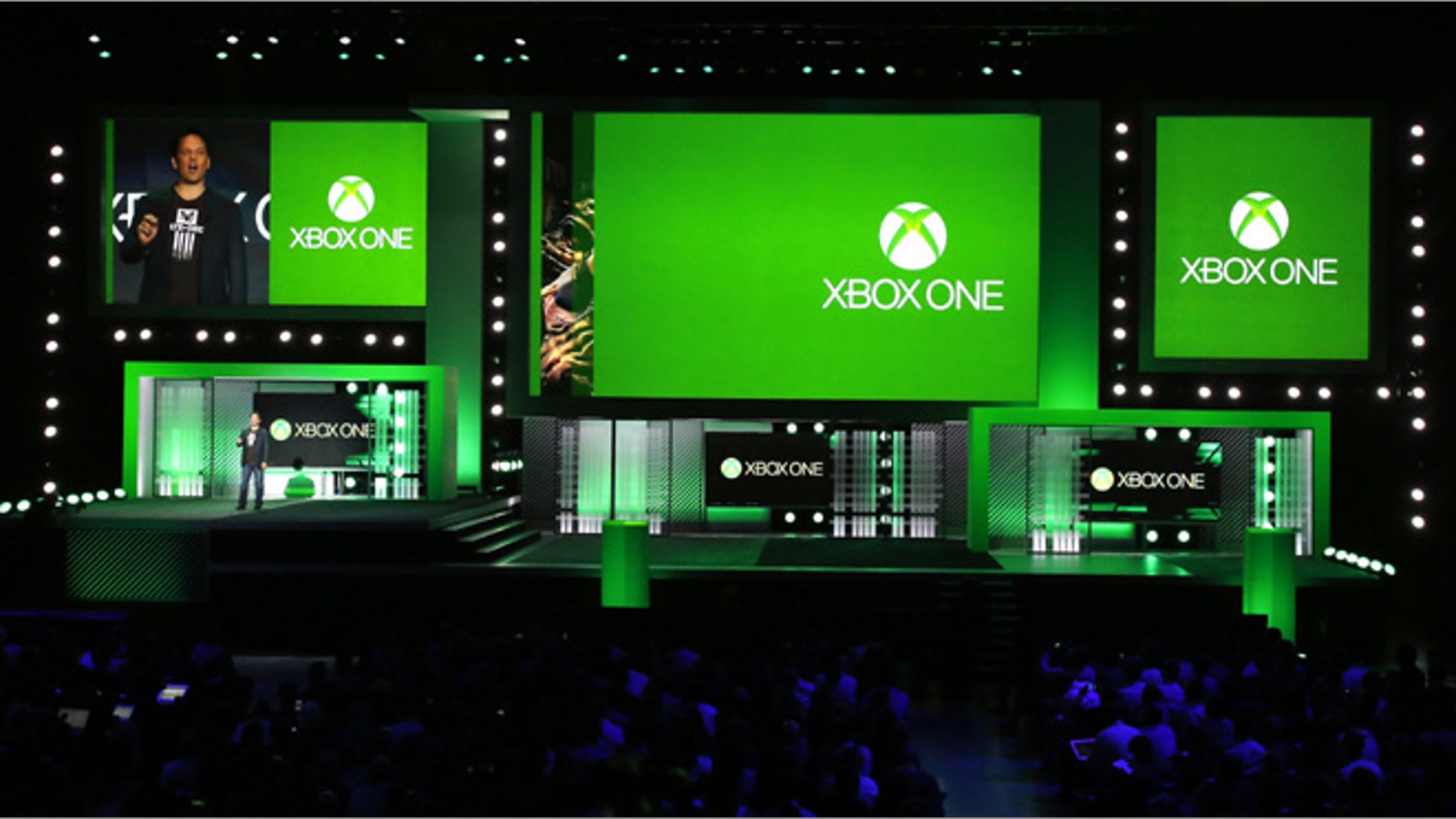 Phil Spencer, corporate vice president of Microsoft Studios, speaks during the Xbox E3 Media Briefing at USC's Galen Center in Los Angeles, California. He later released a statement apologizing for an offensive comment one employee made towards another during a 'Killer instinct' demonstration.
