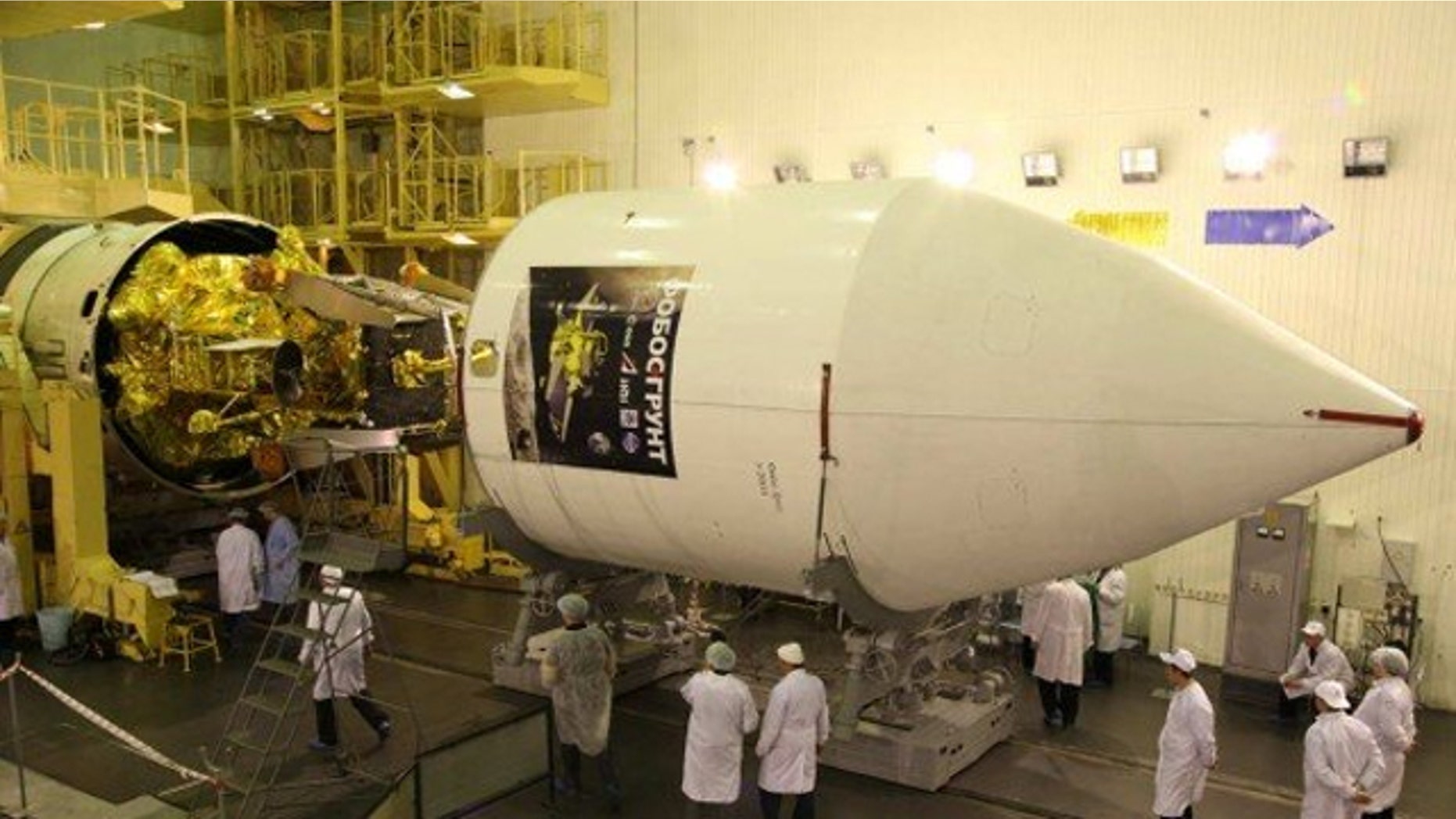 Phobos-Grunt and Yinghuo-1 spacecraft being encapsulated inside the nose cone for November 9 launch (Nov. 8 EST) to Mars and its tiny moon Phobos.