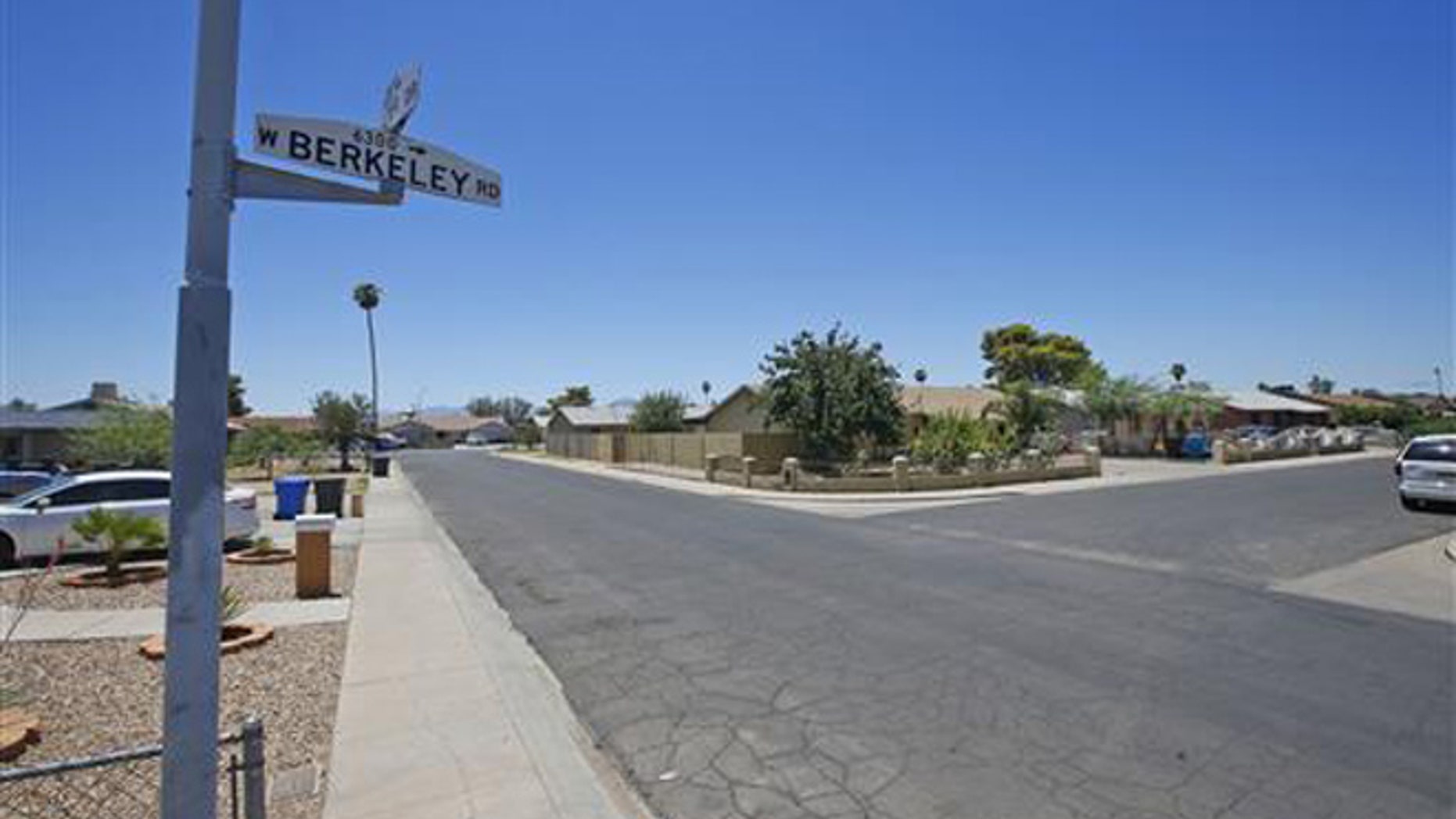 Near this block of West Berkeley Road in the Maryvale section of Phoenix, three persons died in one of a rash of shootings, shown here during the day Friday, July 8, 2016.
