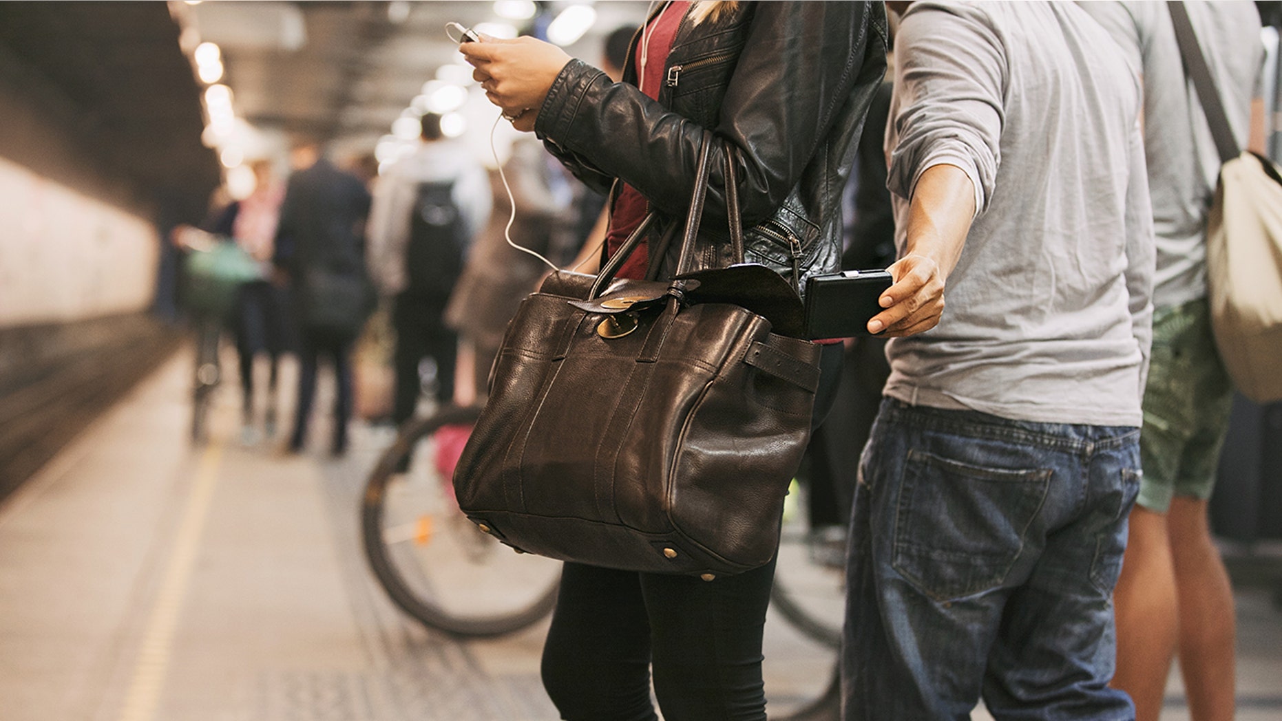 Some scammers all all-too-eager to separate distracted tourists from their belongings.