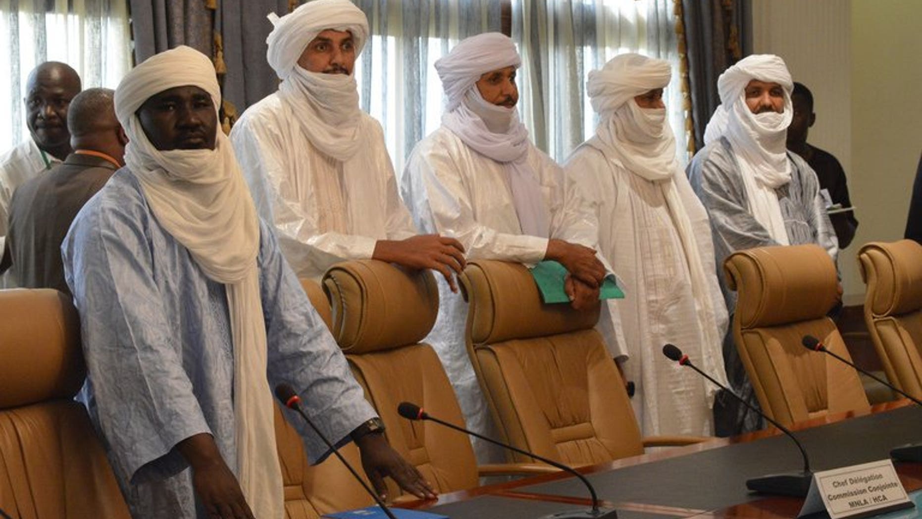 Tuareg delegates arrive to meet a Mali government delegation in Ougadougou, Burkina Faso, last week. Bamako will sign a deal with Tuareg rebels on Tuesday that is expected to pave the way for nationwide polls next month, a Mali government envoy told AFP.