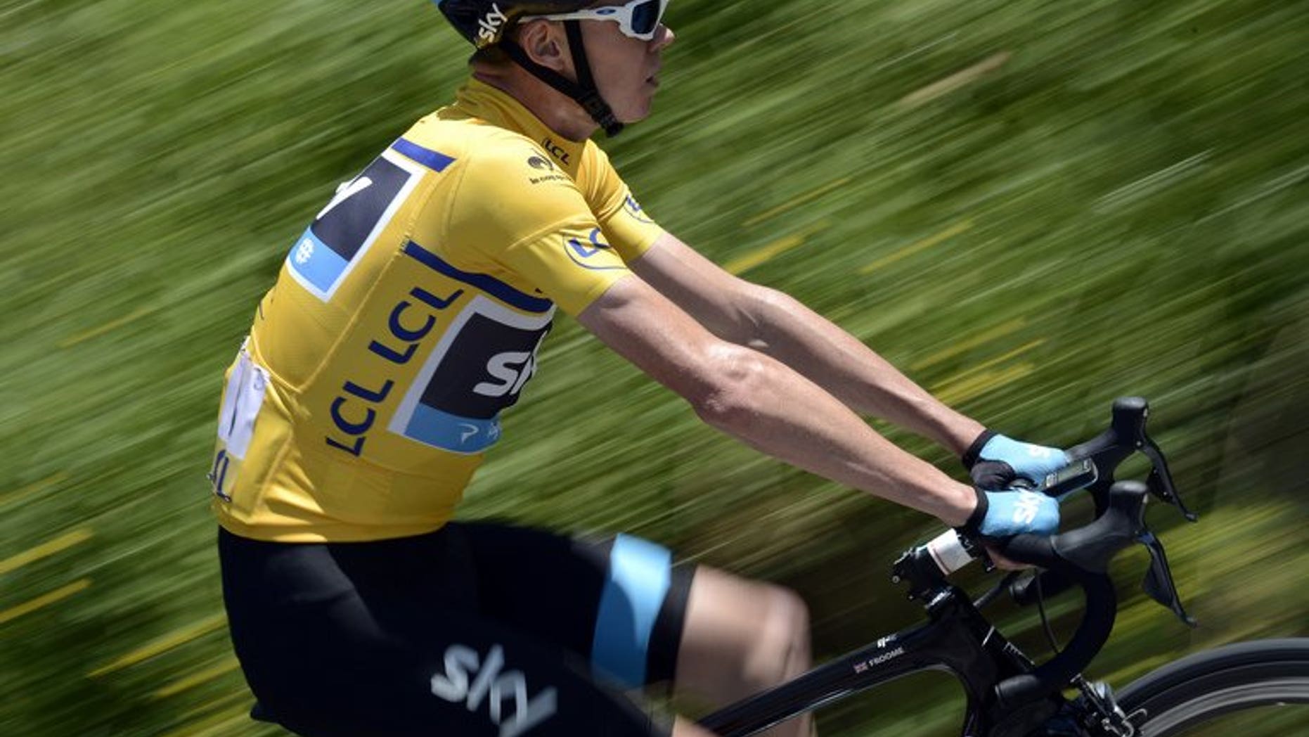 Britain's Christopher Froome rides during the 65th edition of the Dauphine Criterium cycling race on June 7, 2013 between La Lechere-les-Bains and Grenoble. Spain's two-time Tour de France champion Alberto Contador has been nominated by race favourite Froome as his biggest threat for this year's edition, which gets underway on June 29 in Corsica.
